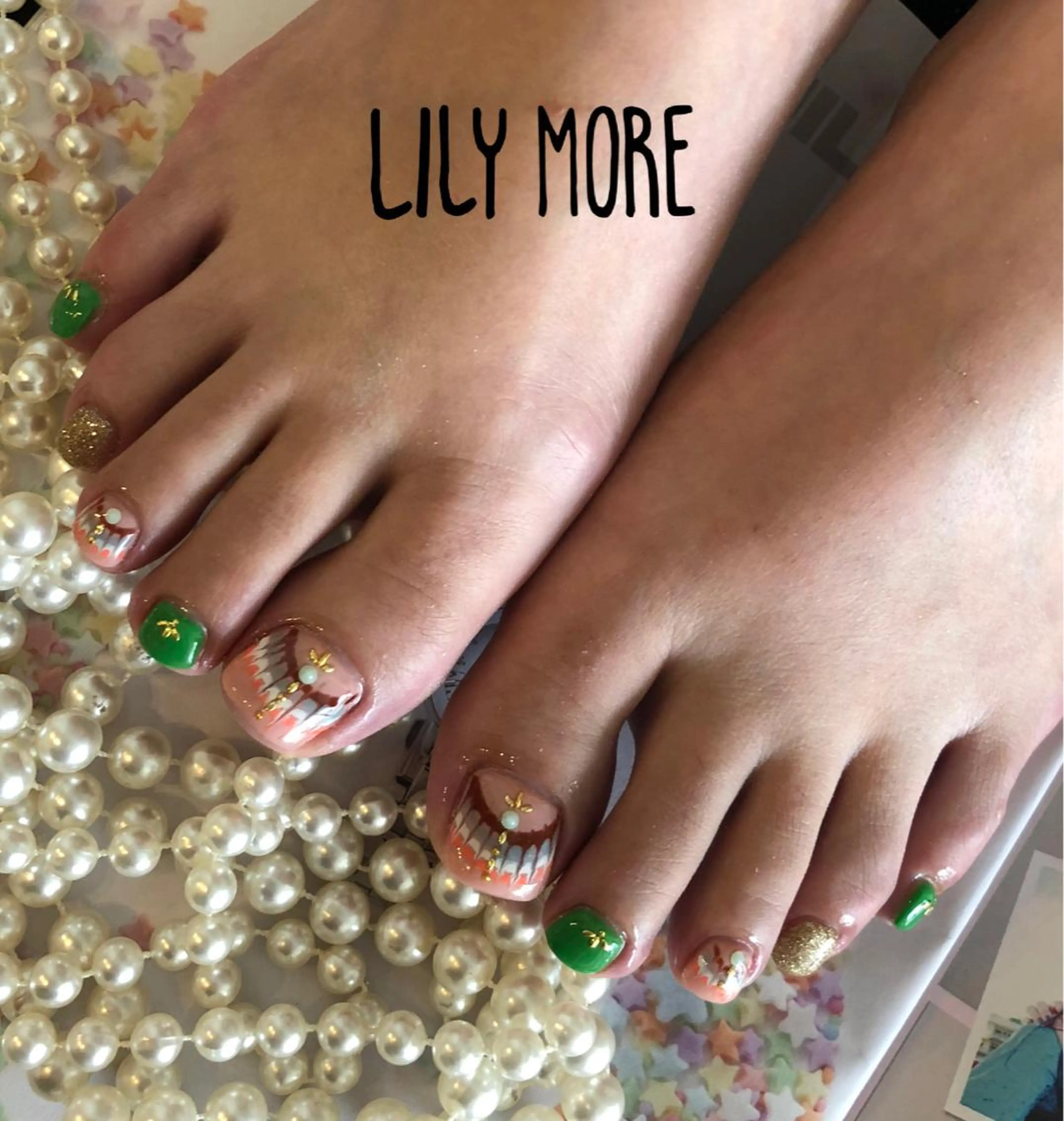 ネイル ピーコックネイル Lily closetのネイルデザイン