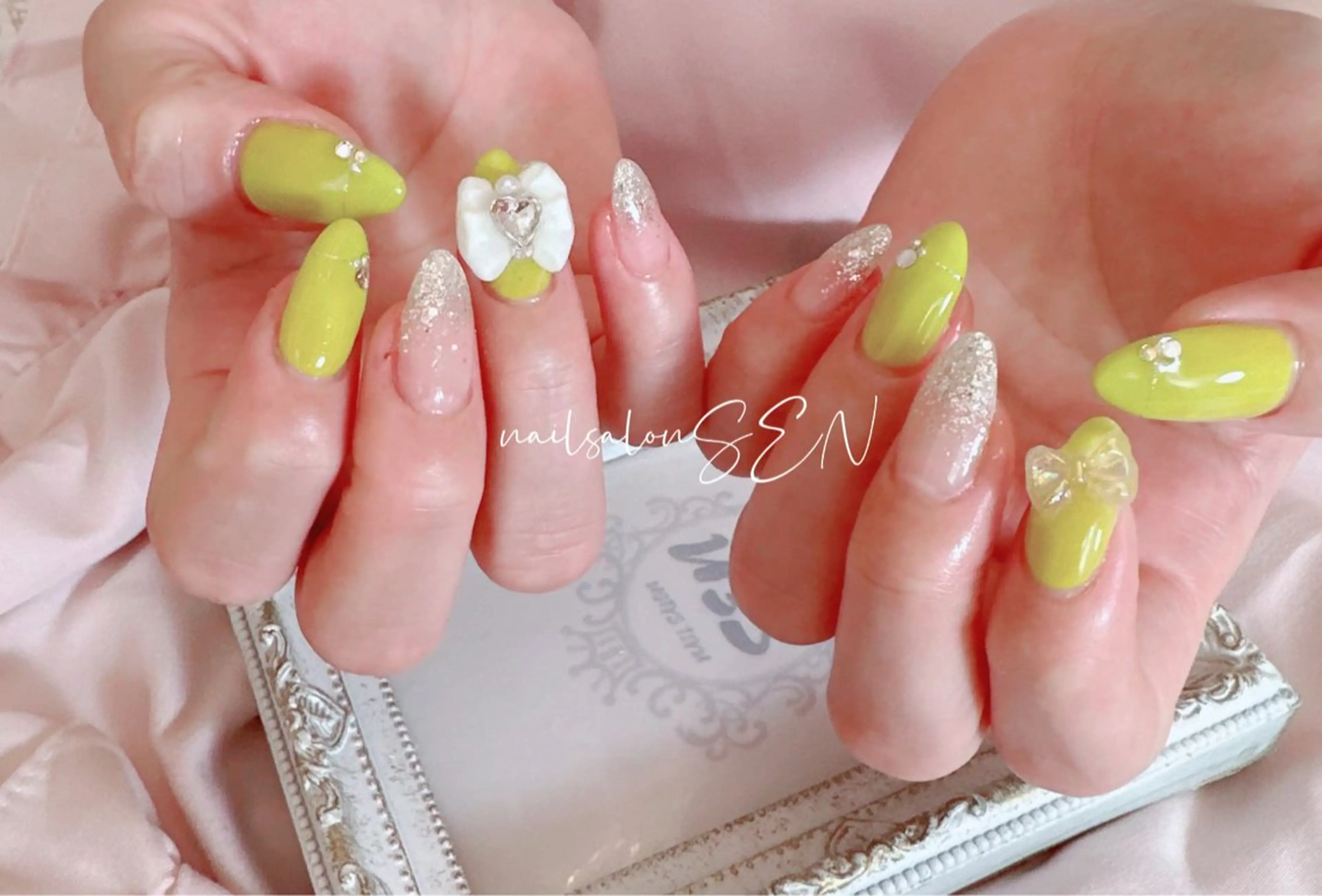 ネイル リボン ハンドネイル nailsalonsen所属・nail salon SENのネイルデザイン