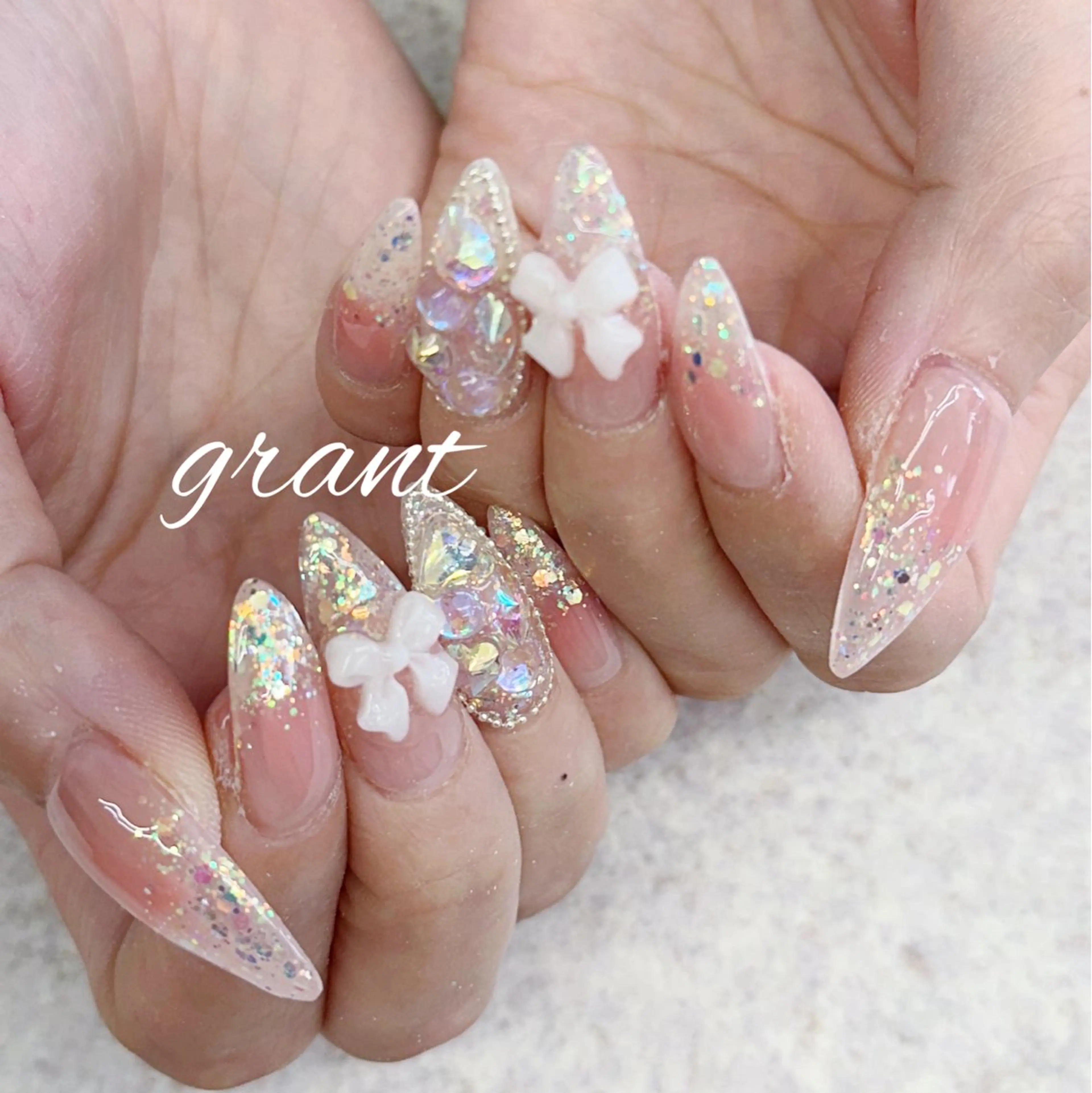ネイル チークネイル リボン ハンドネイル nail salon grant所属・nailsalon grantのネイルデザイン
