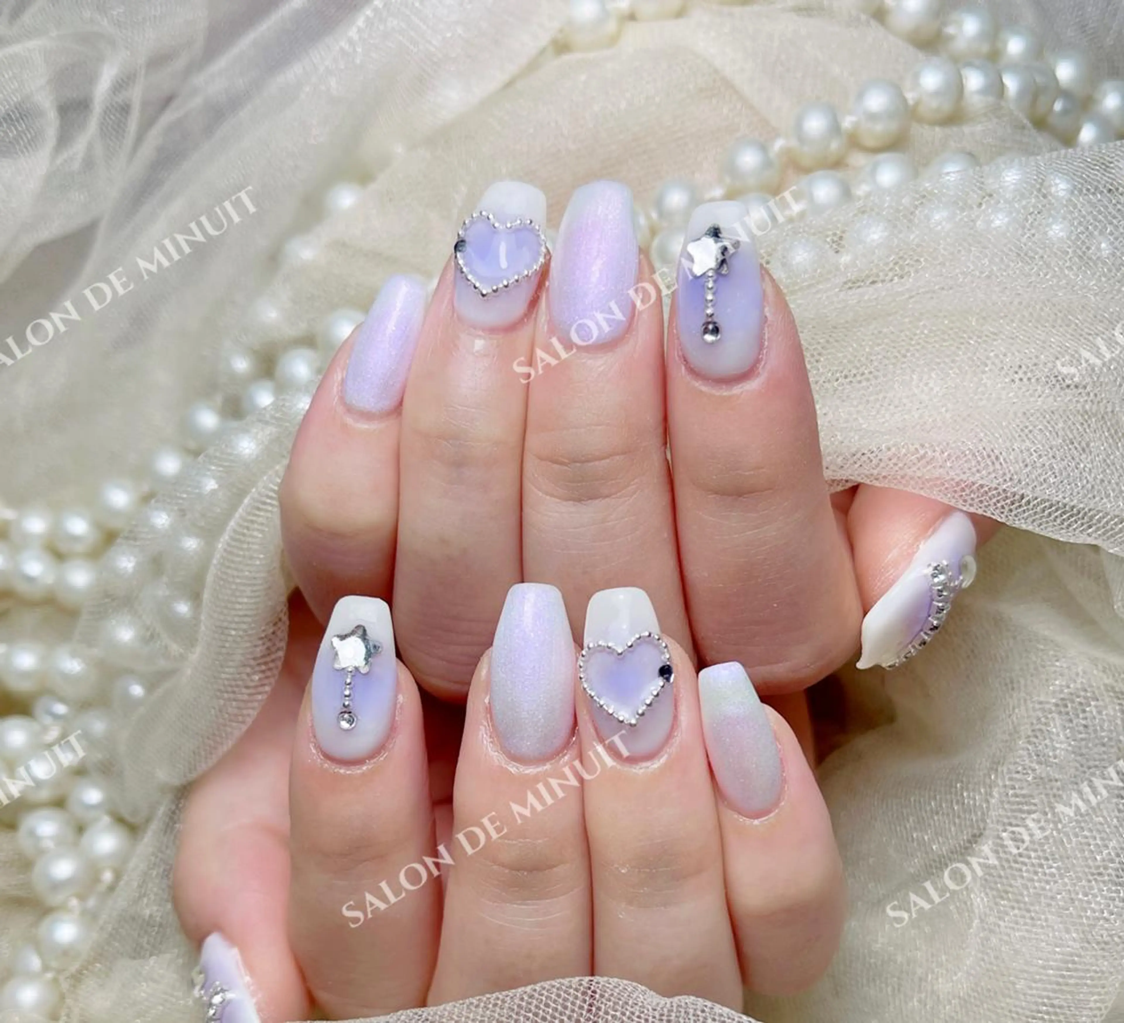 ネイル Salon de Minuit🦩のネイルデザイン