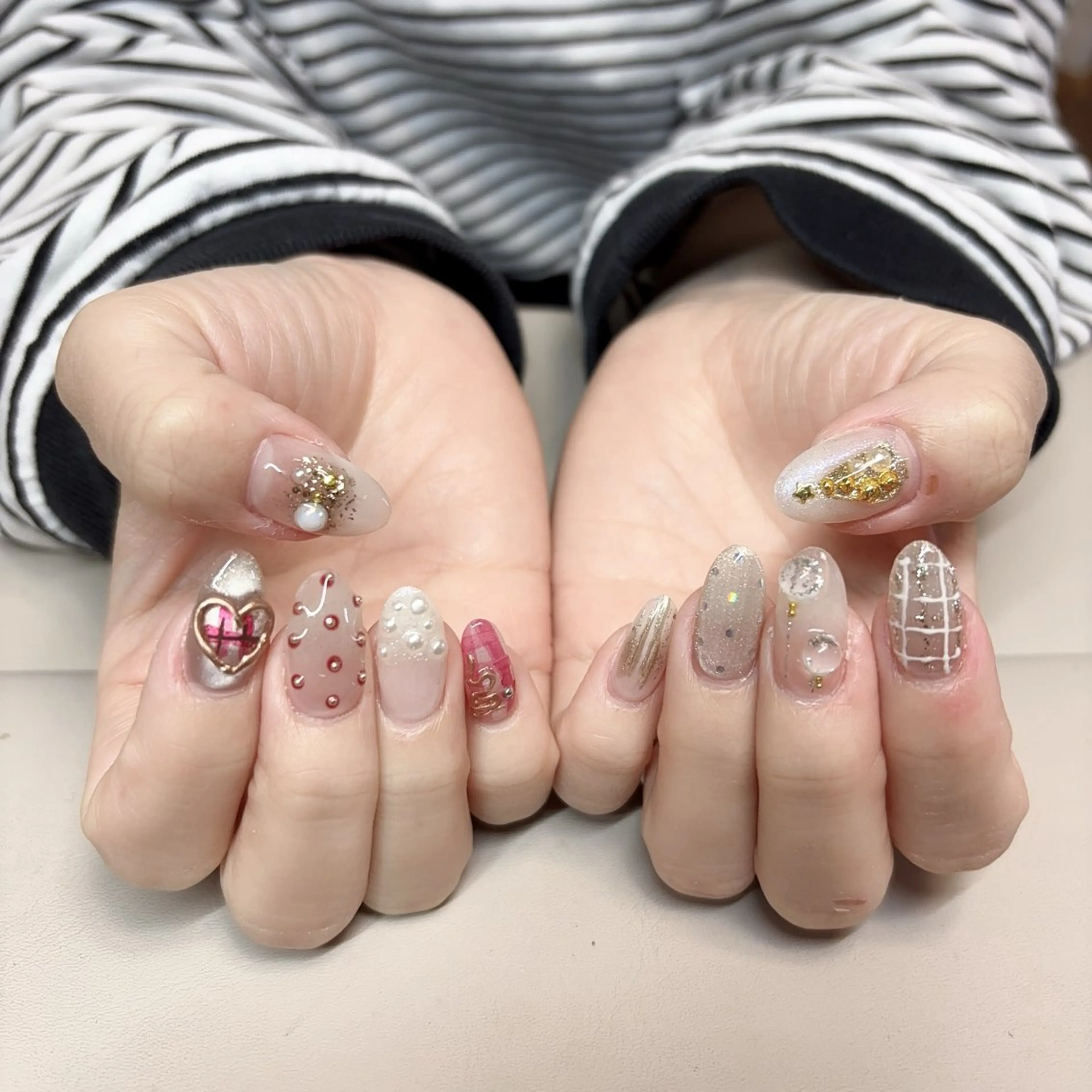 ネイル アニマル柄 アートネイル オーロラネイル べっ甲ネイル ブラウン ハンドネイル e llaのネイルデザイン