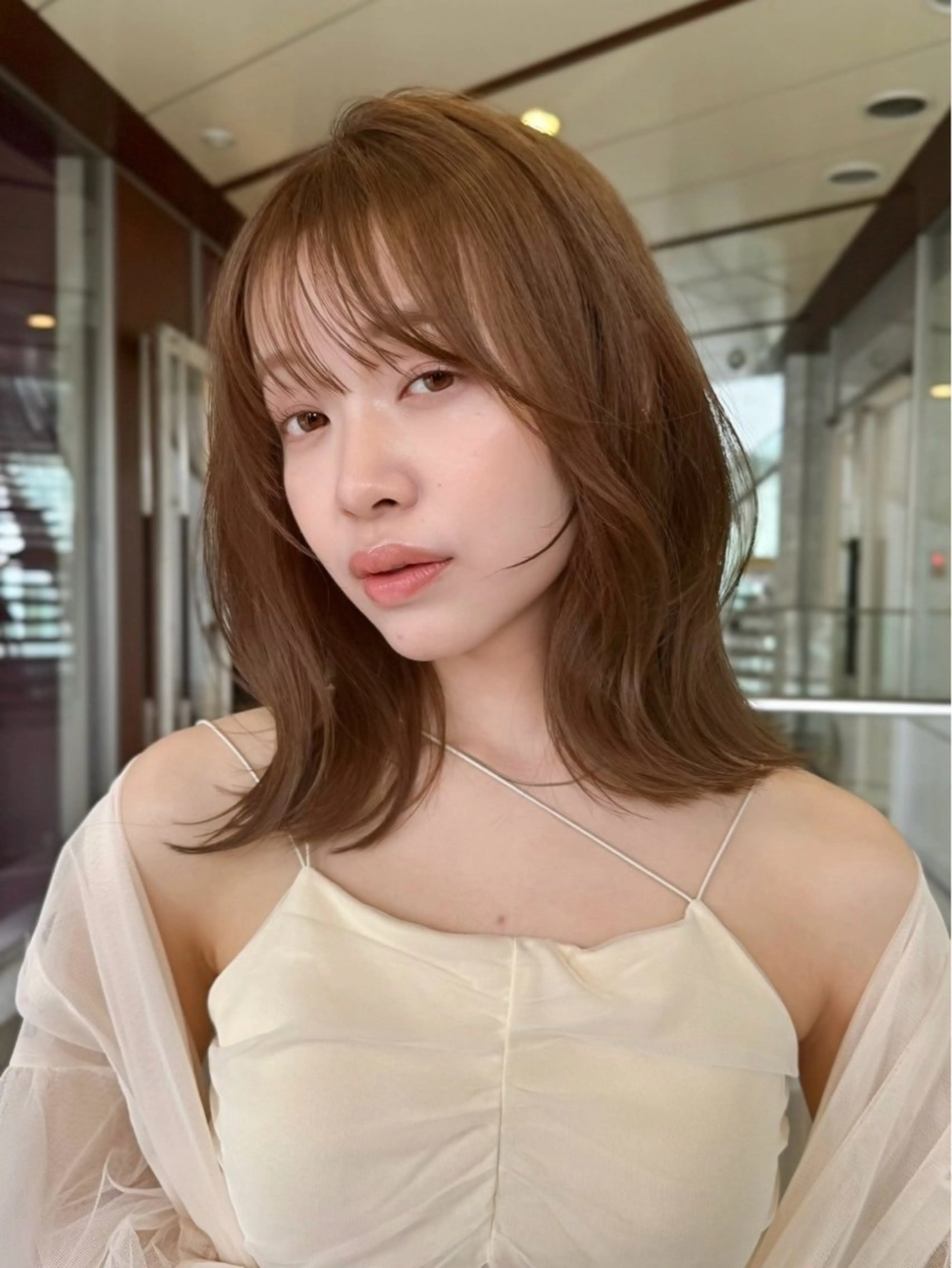 ミディアム レイヤーカット 外ハネヘア SHEA.所属・表参道SHEA Am i／レイヤーカットのヘアスタイル