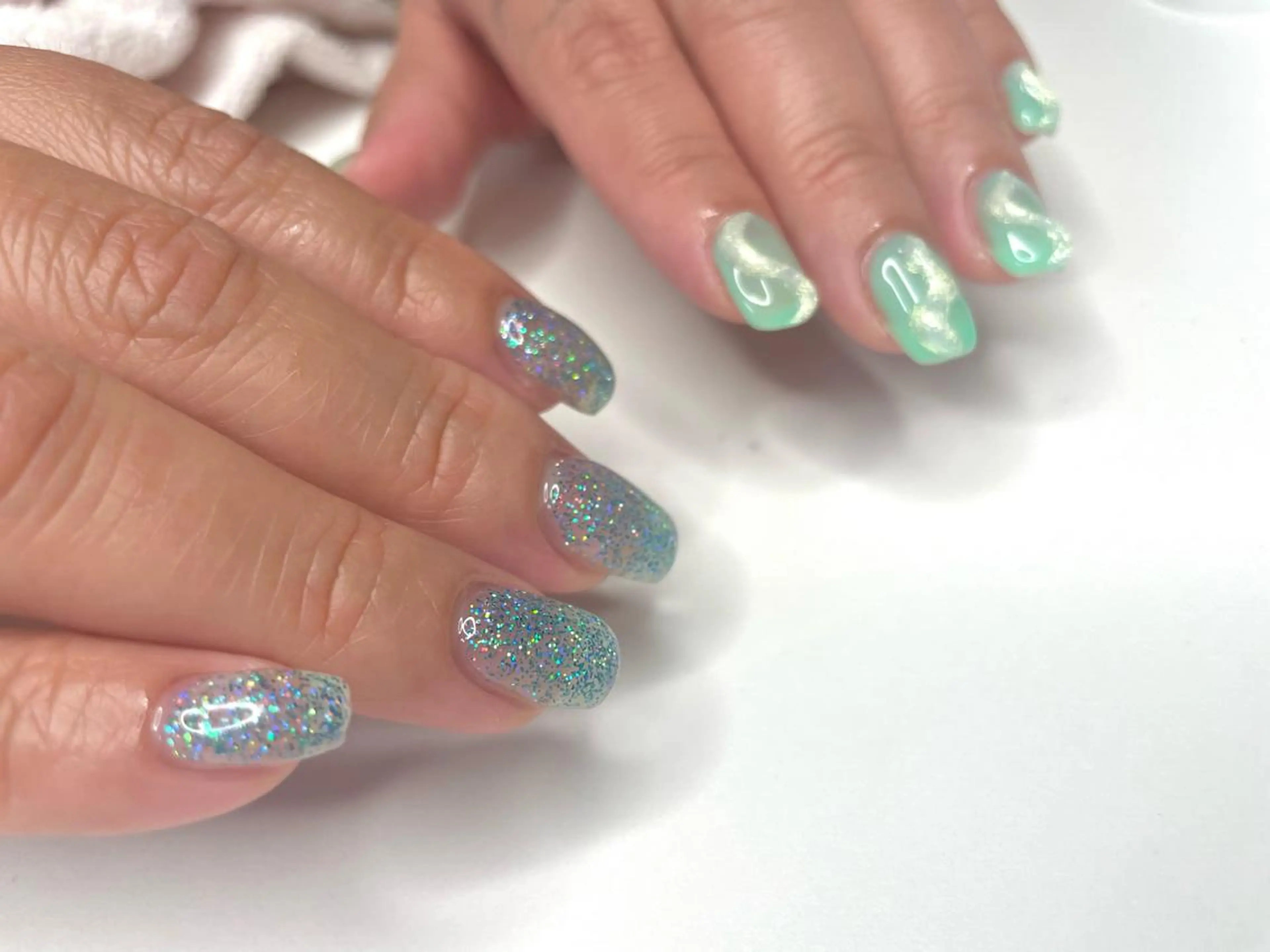 ネイル クリアネイル フラッシュネイル 氷ネイル・うるうるネイル ラメ(グリッター) ロングネイル Ri-e's nailのネイルデザイン