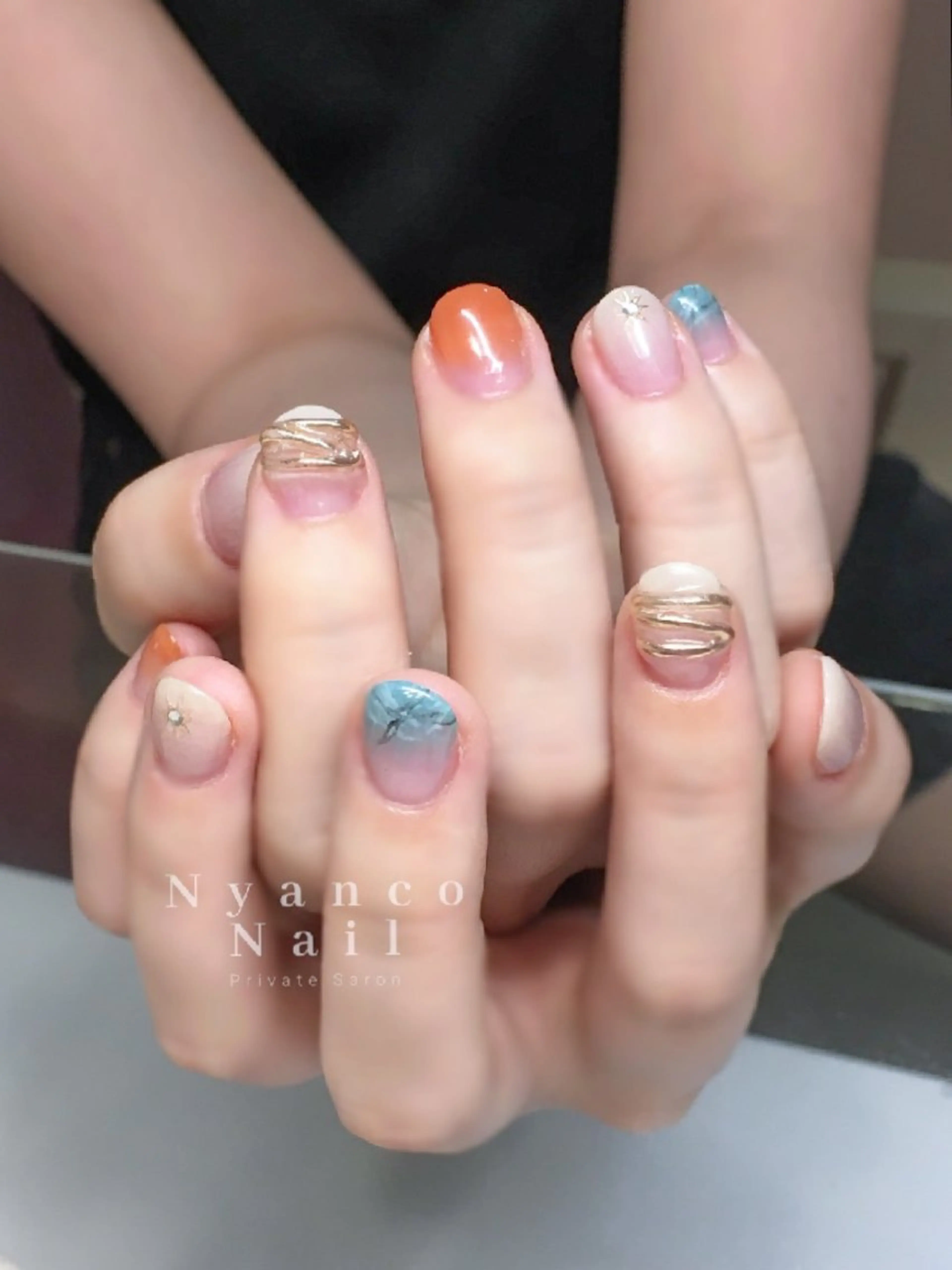 ネイル ジェルネイル ニュアンスネイル オレンジ 夏ネイル Nyanco Nailのネイルデザイン