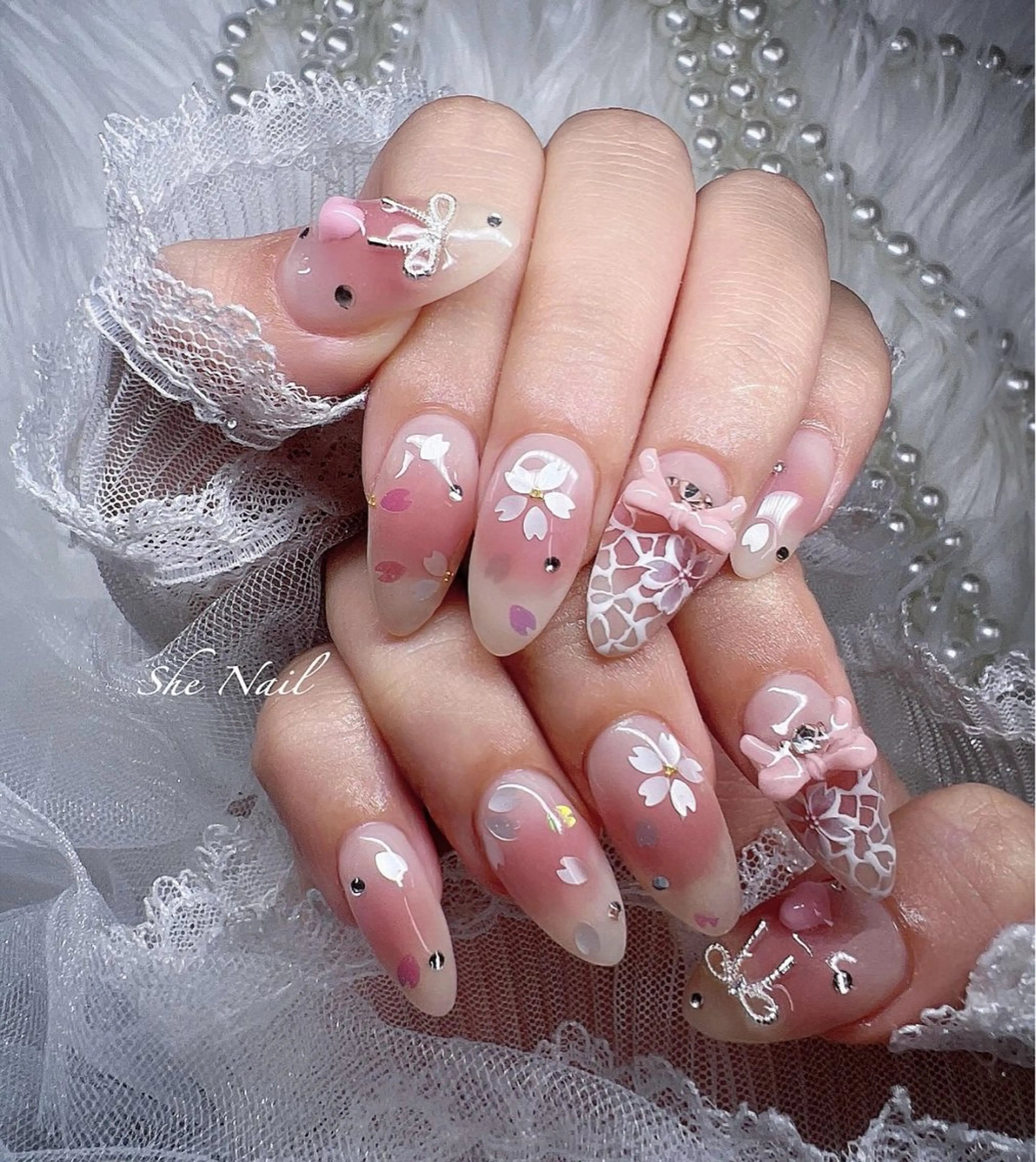 ネイル チークネイル 桜ネイル 長さ出し フレンチネイル ガラスフレンチ She Nail所属・ISA_ BELLAのネイルデザイン