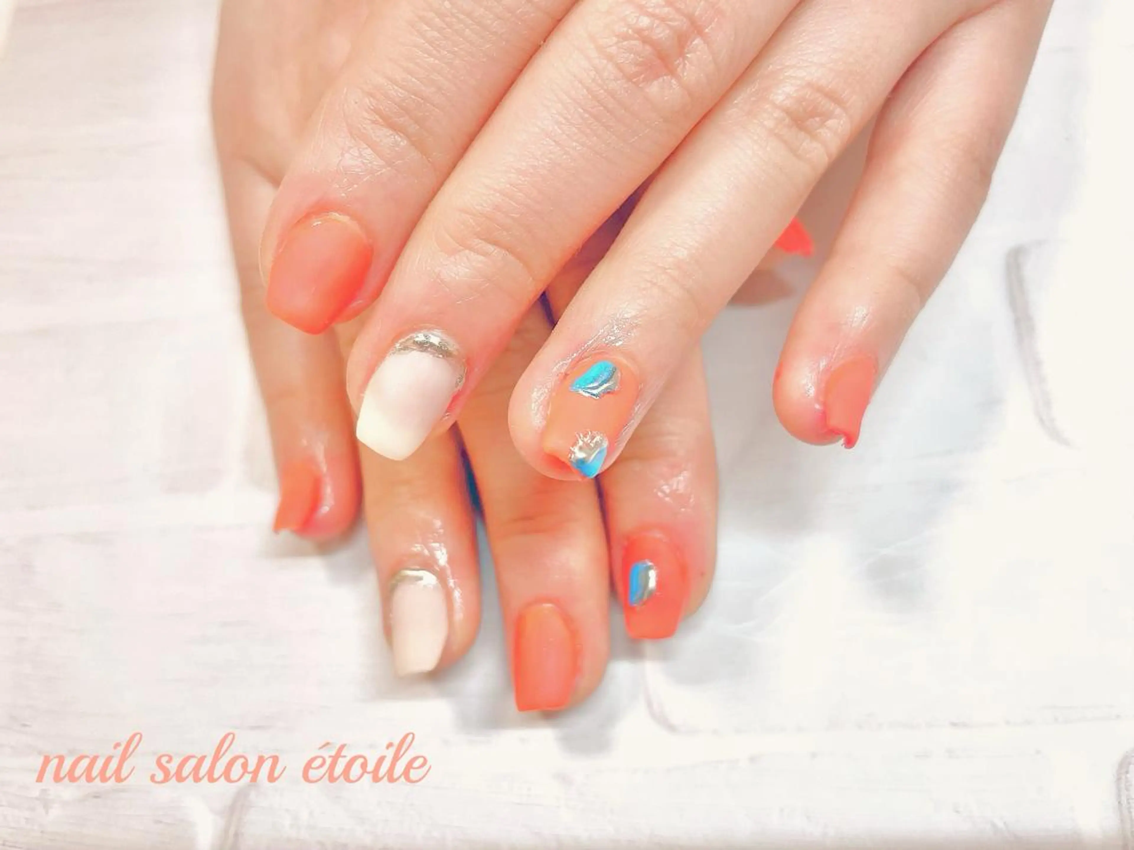 ネイル ジェルネイル ミラーネイル オレンジ シルバー ハンドネイル nail salon étoileのネイルデザイン