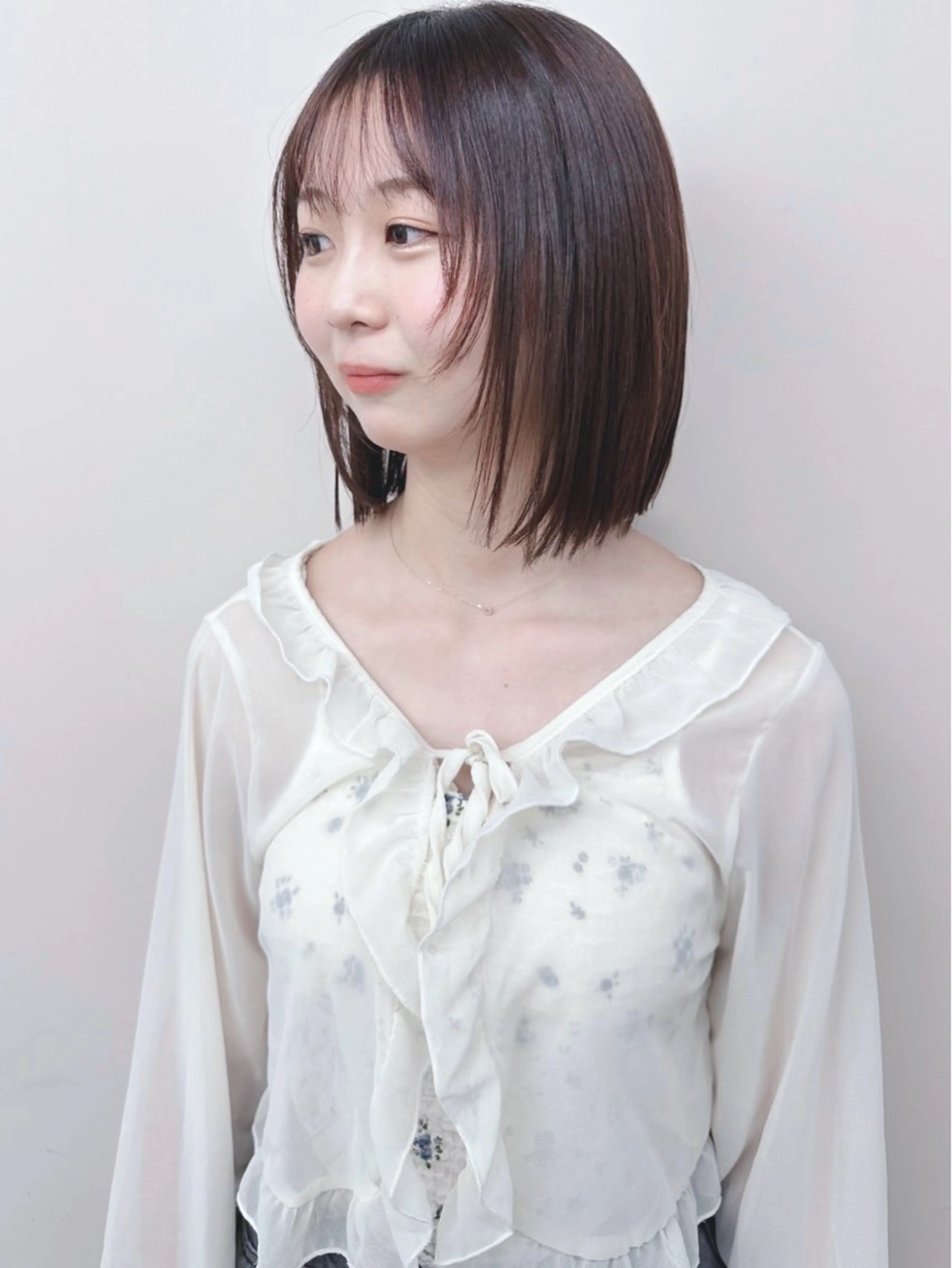 ミディアム とうい/パーマボブ/ くせ毛/丸みボブのヘアスタイル