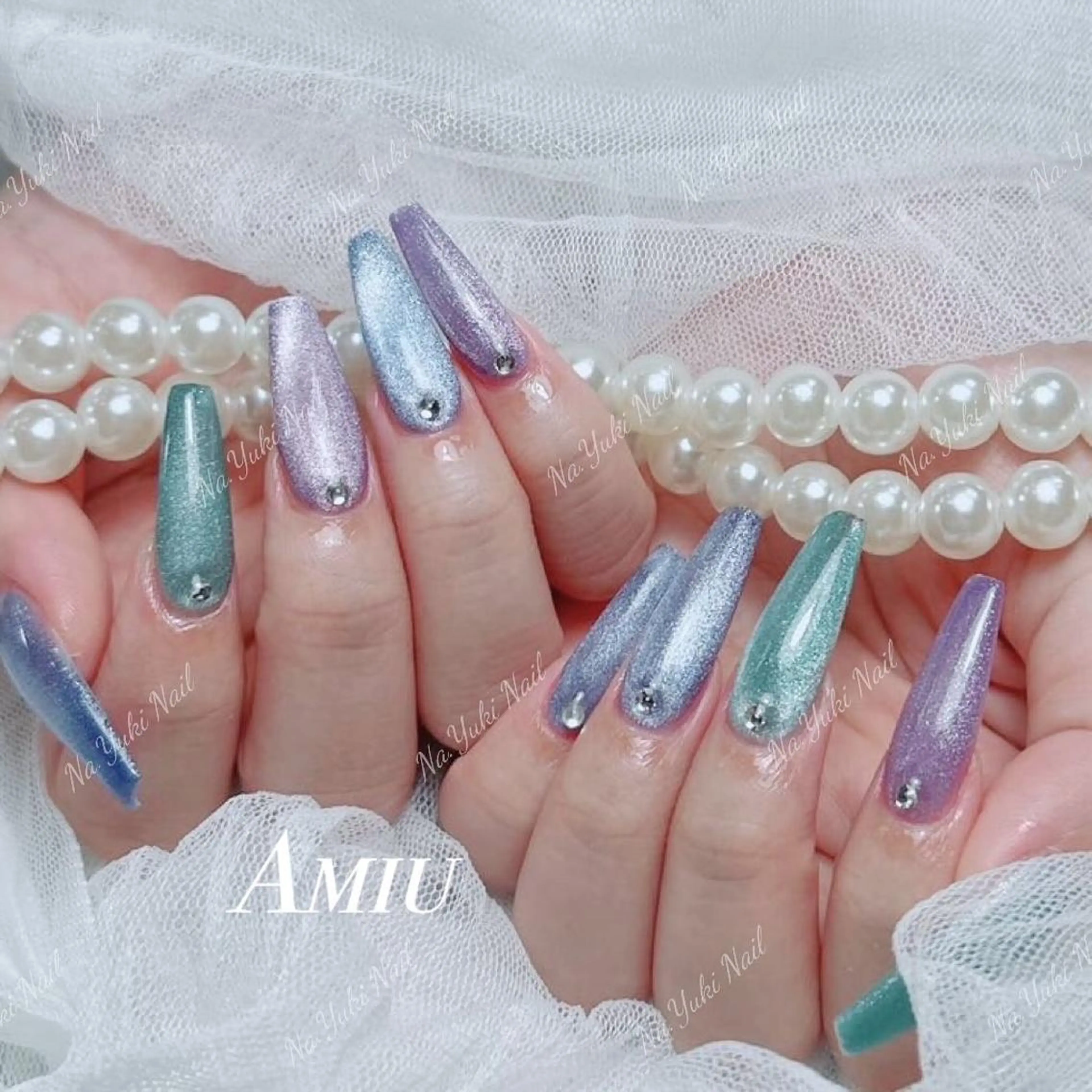 ネイル Queenie 🦋のネイルデザイン