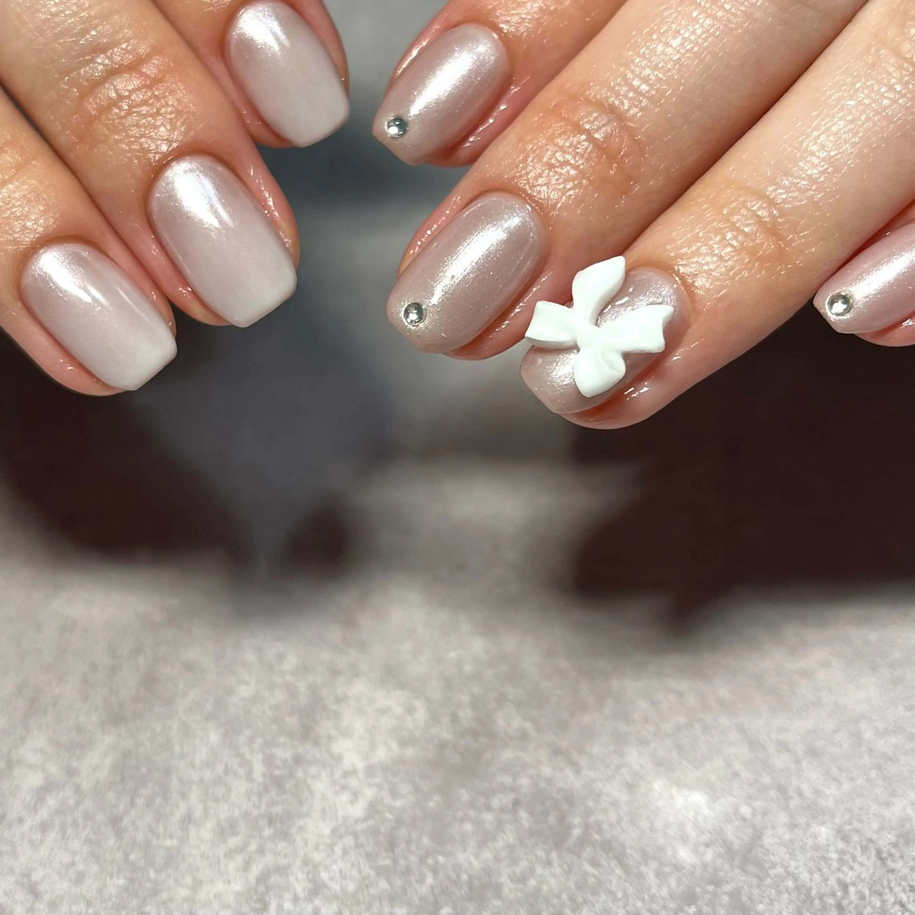 ネイル グラデーション ぷっくりネイル リボン 春ネイル ストーンネイル ハンドネイル kupu所属・ネイルサロン kupuのネイルデザイン