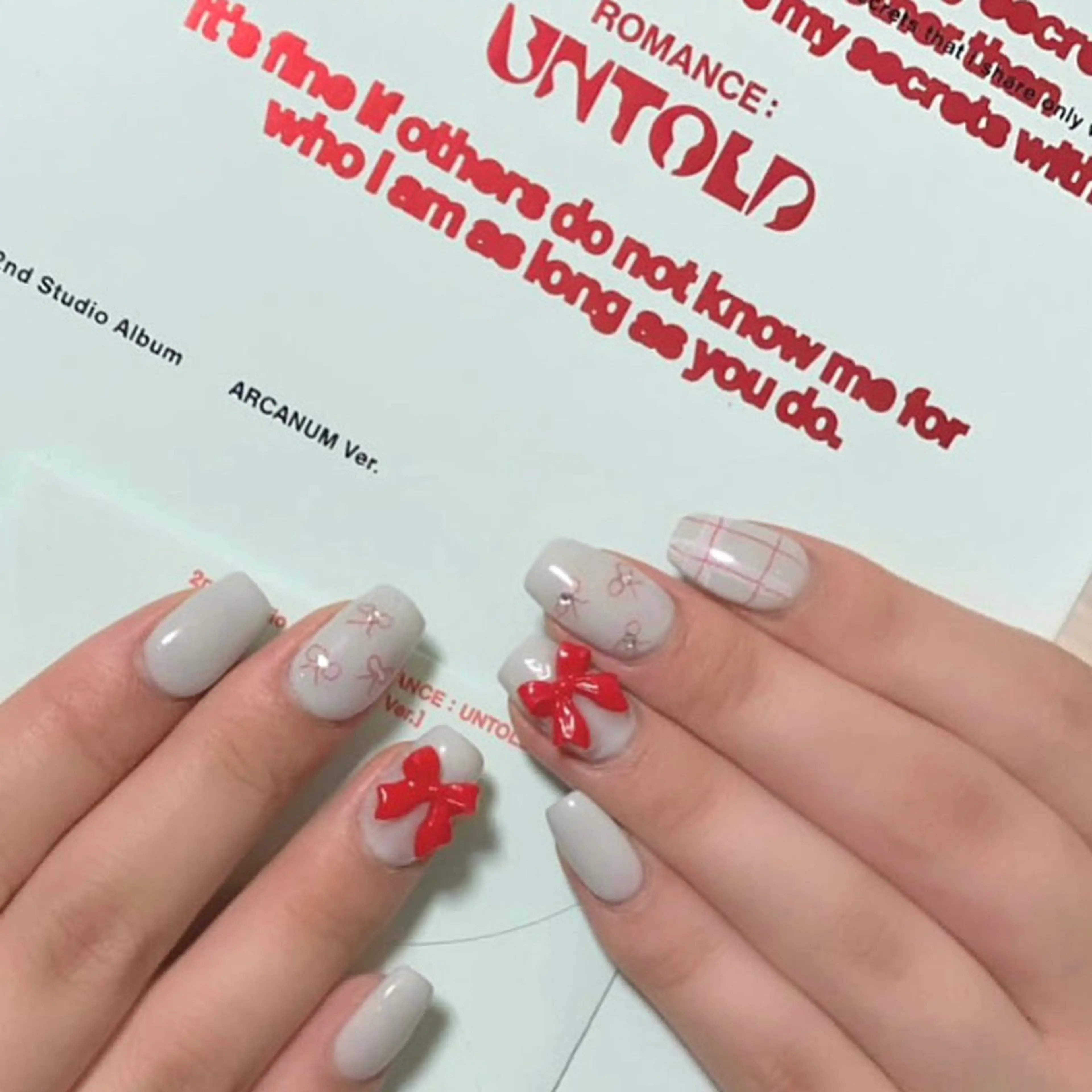 ネイル 赤色 リボン Nail Total beauty salon Laki所属・佐々木 優花のネイルデザイン