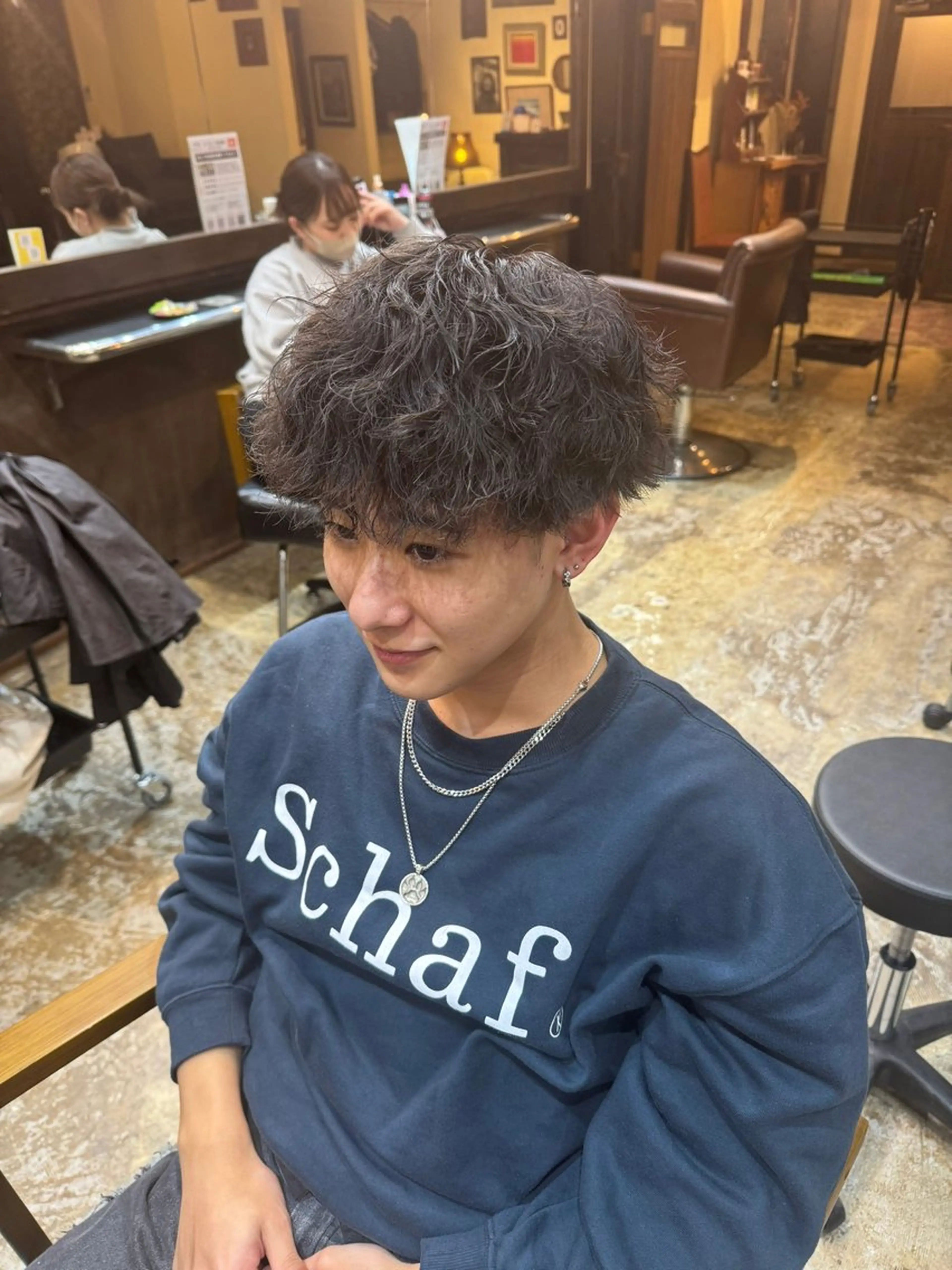 カット+ツイストスパイラルパーマの写真