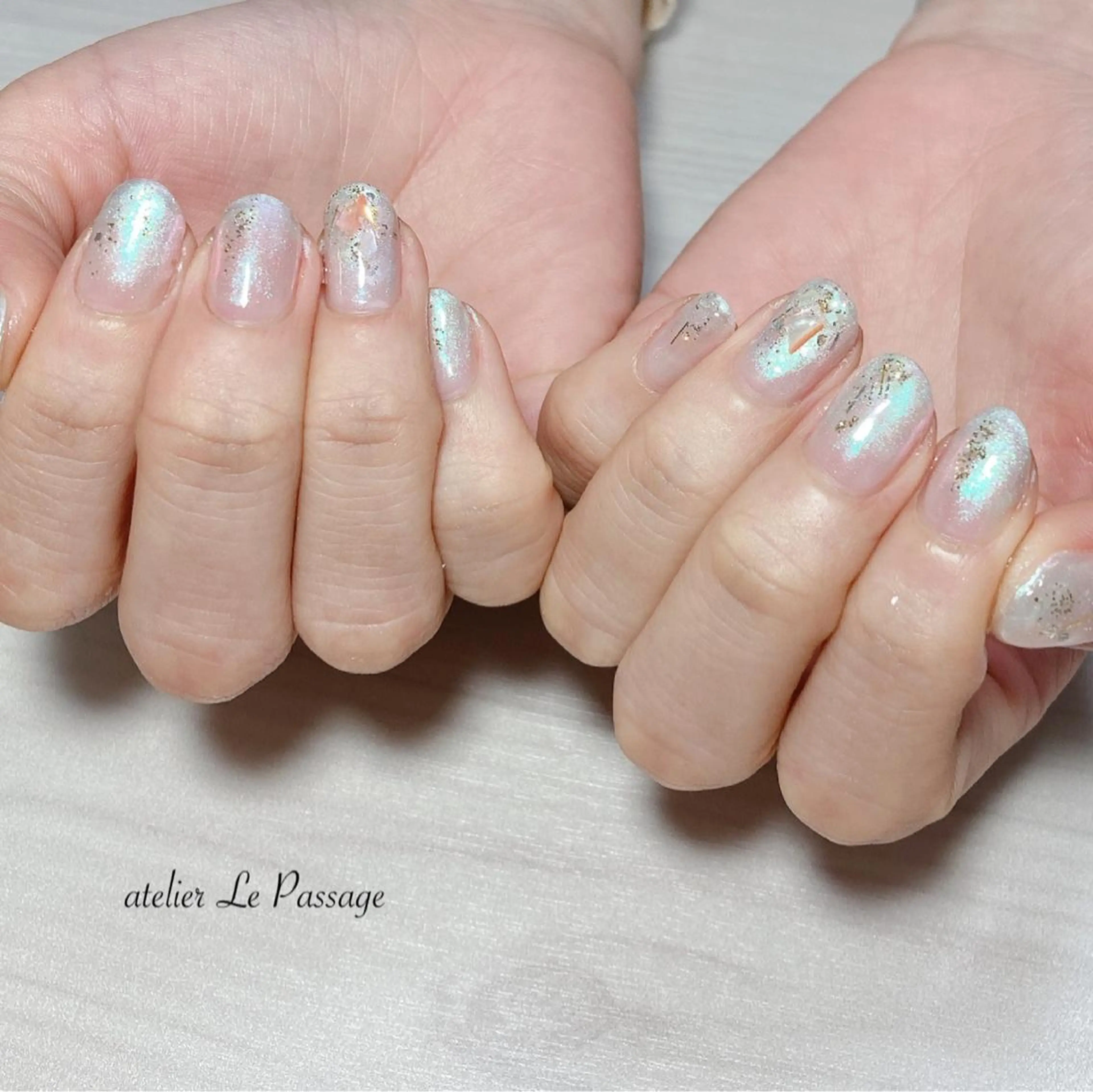 ネイル オーロラネイル ジェルネイル 氷ネイル・うるうるネイル ニュアンスネイル オフィスネイル Atelier Le Passage所属・h nakatsukaのネイルデザイン