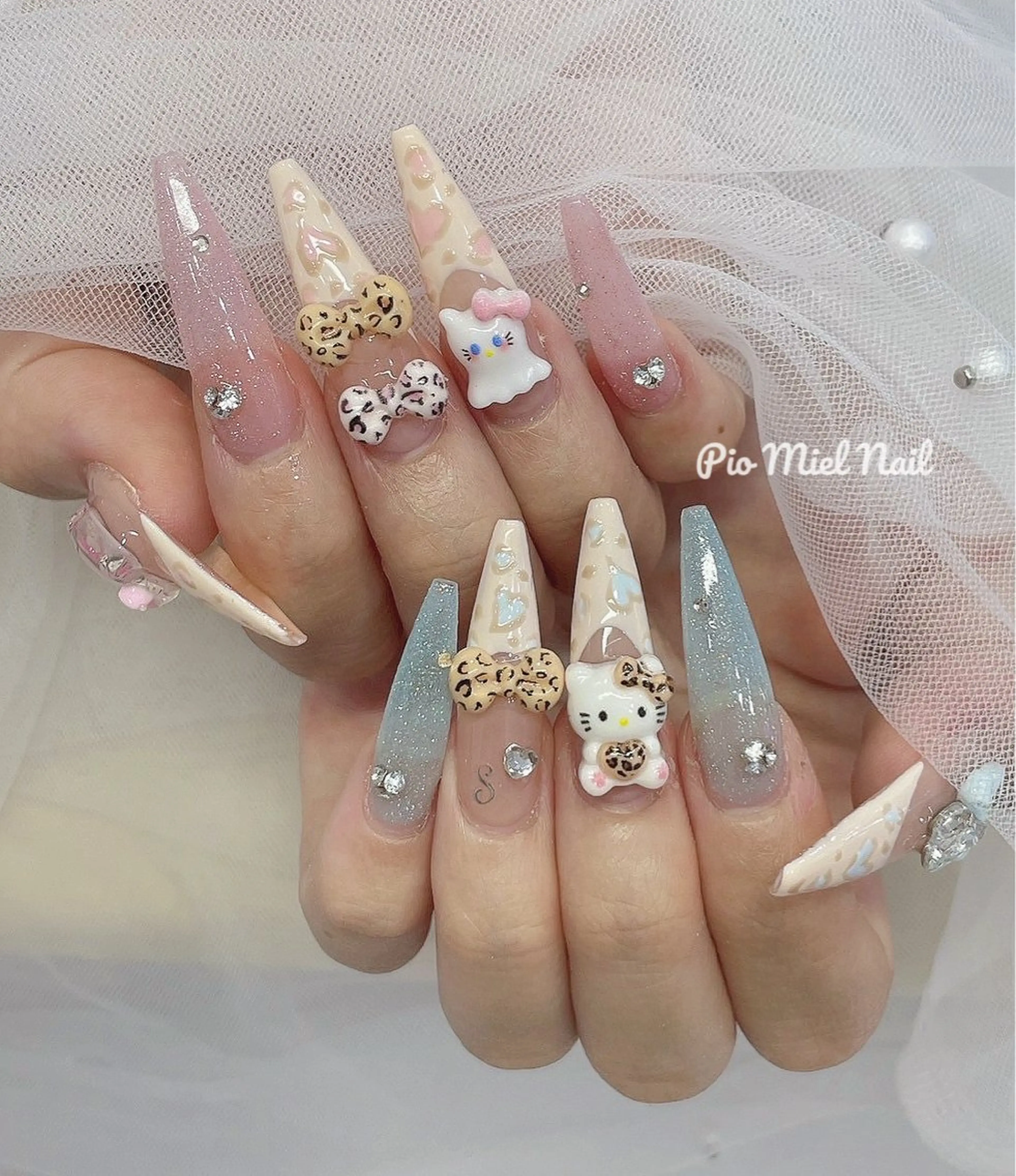 ロング ハンドネイル ハンドケア Pio Mielのネイルデザイン