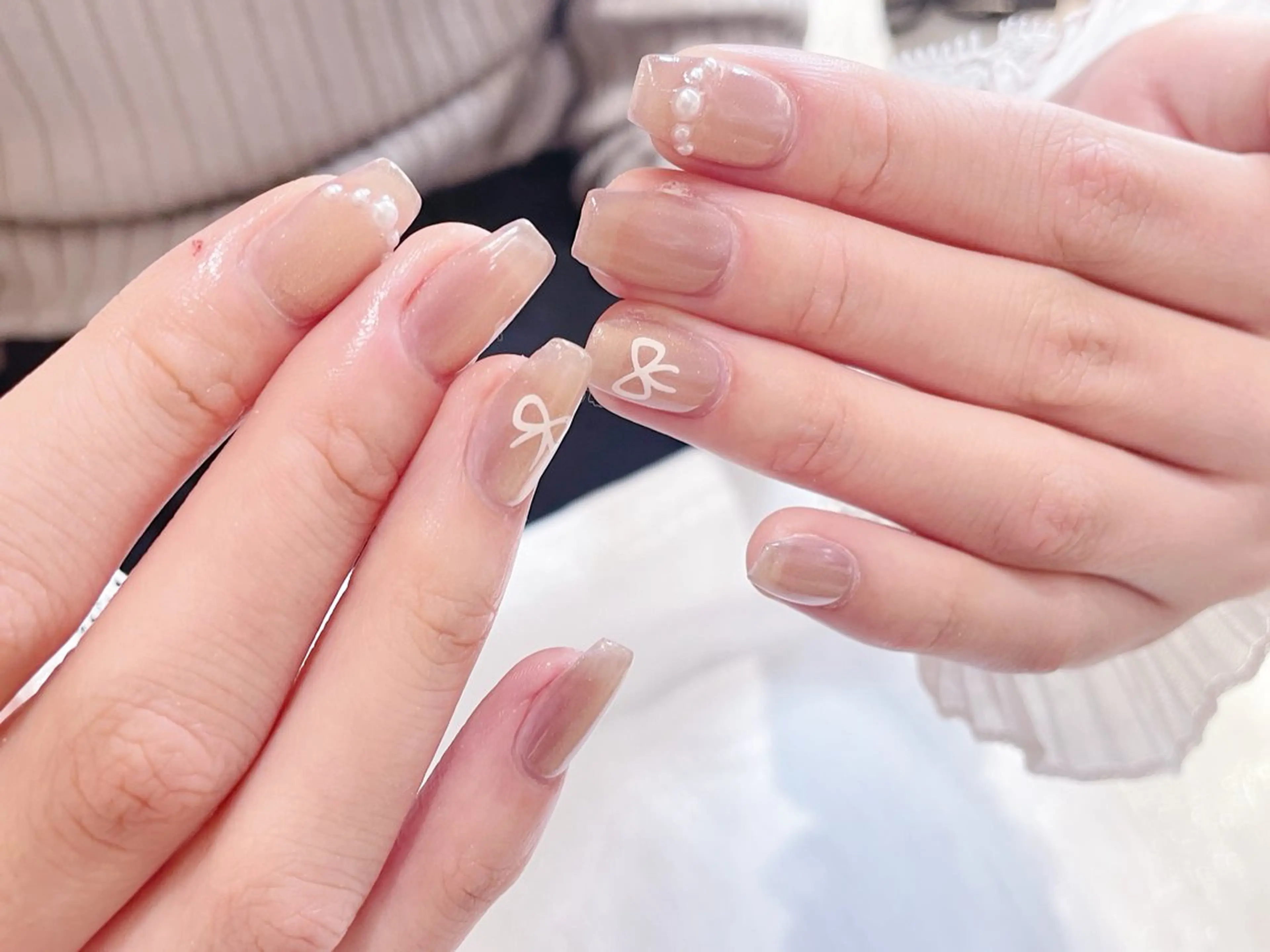 ネイル チークネイル 長さ出し フラワーネイル フレンチネイル ガーリー ハンドネイル ハンドケア Sun Nail 池袋のエステ・リラクイメージ
