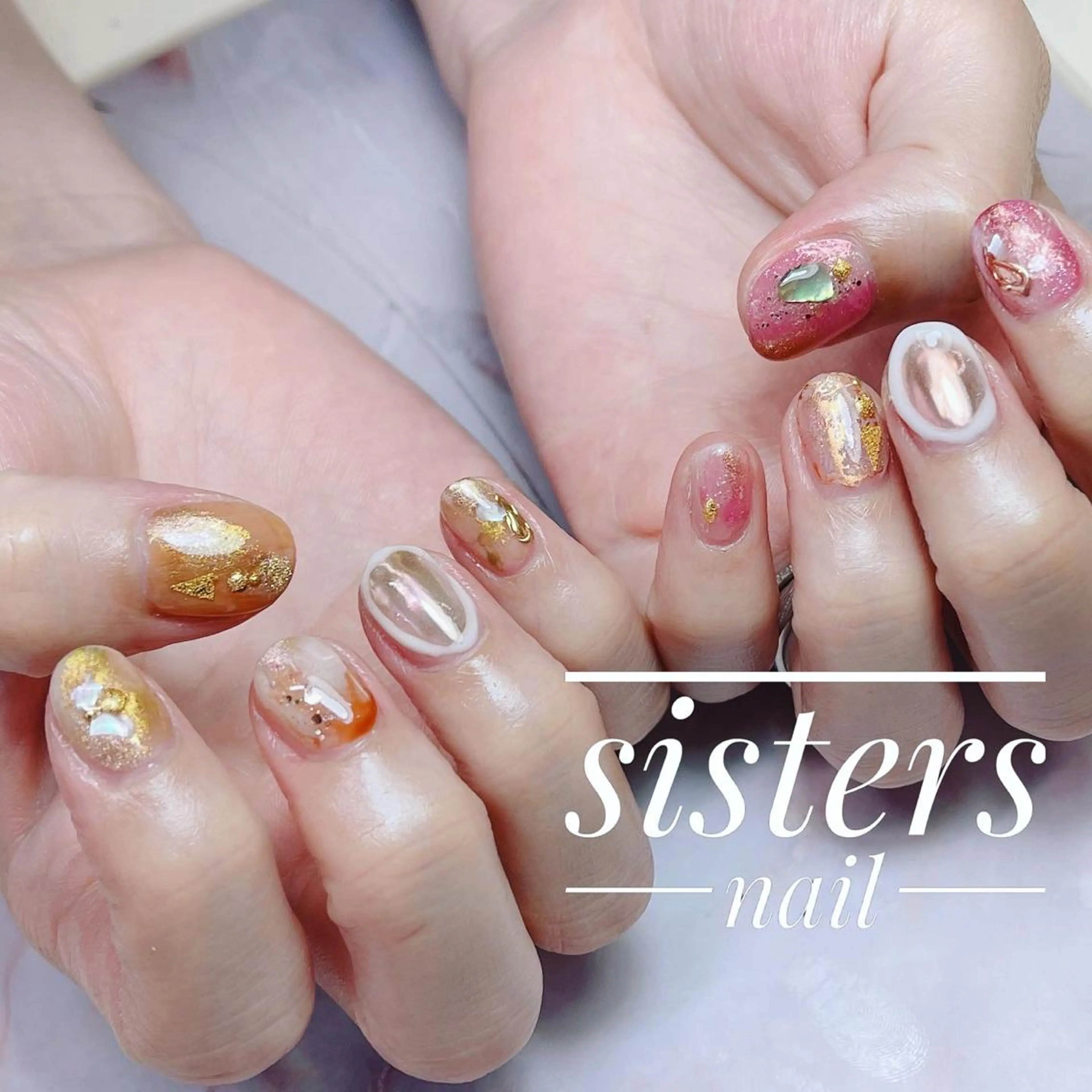 ネイル アートネイル ニュアンスネイル オレンジ ピンク 夏ネイル ハンドネイル ハンドケア sisters nail.fのネイルデザイン