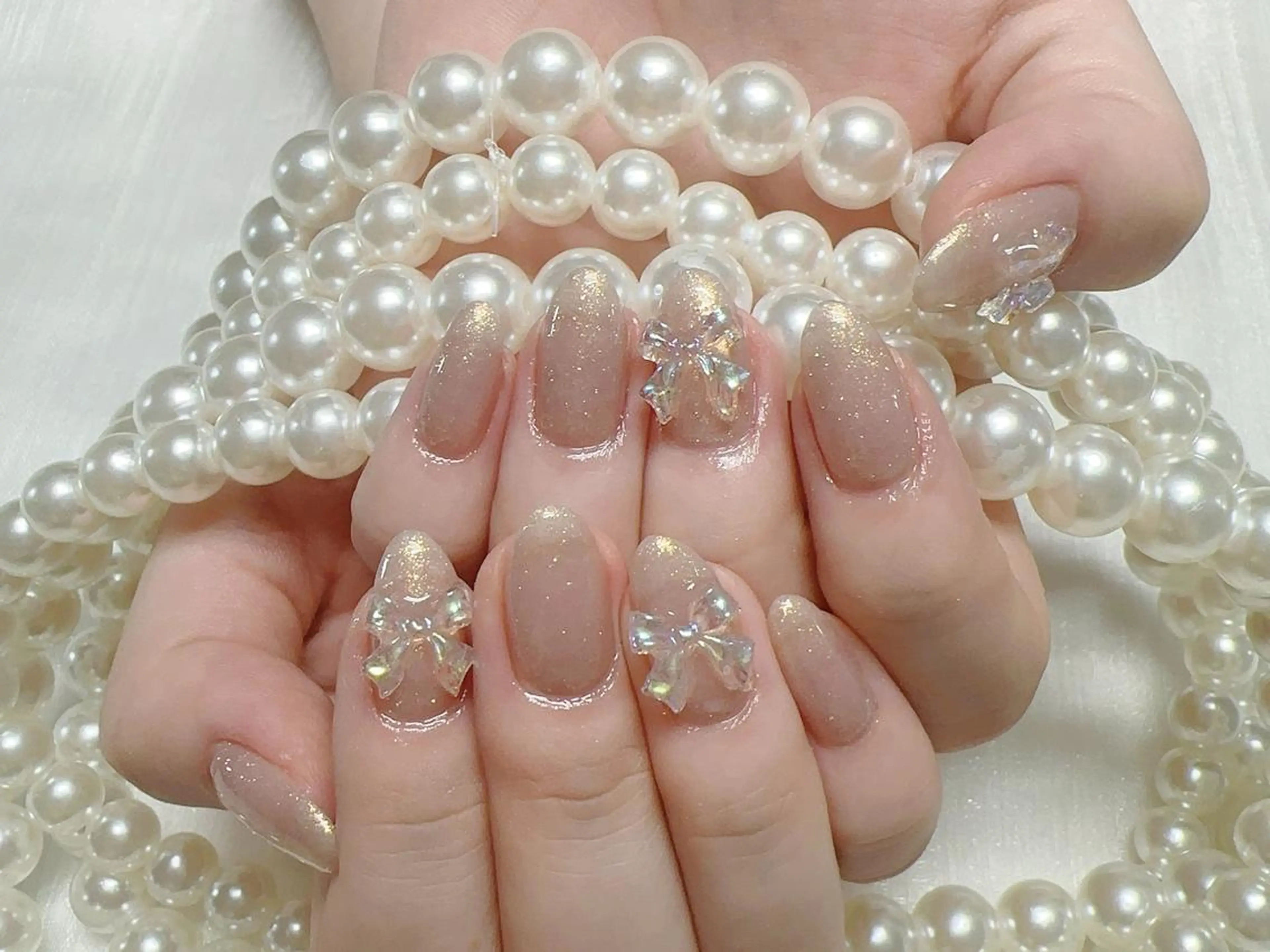 ネイル オーロラネイル 長さ出し フレンチネイル ガーリー キラキラネイル ハンドネイル Lucky nail salonのネイルデザイン