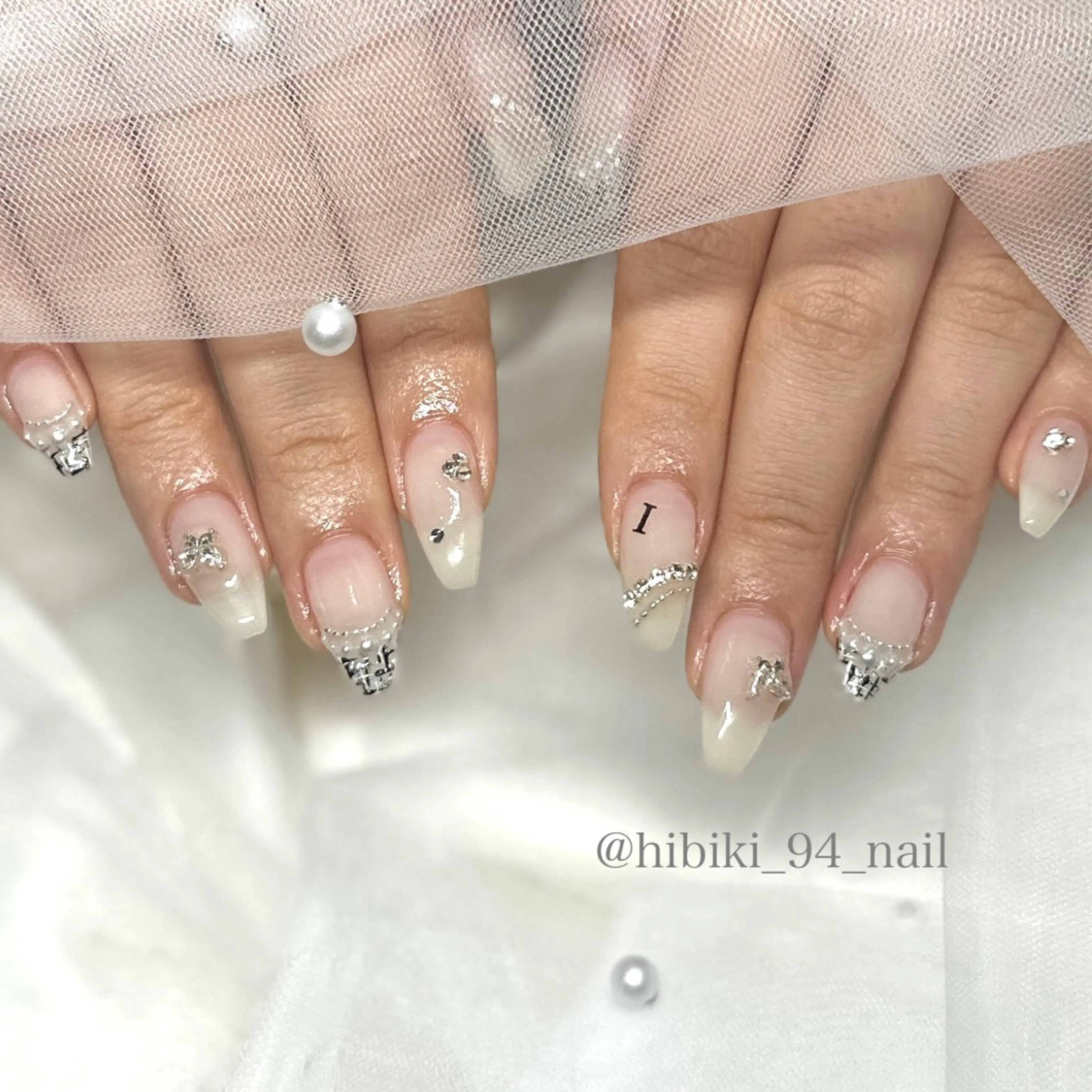 ネイル フレンチネイル ガーリー 韓国ネイル マグネットネイル リボン ハンドネイル L'oeillet所属・L'oeillet HIBIKIのネイルデザイン