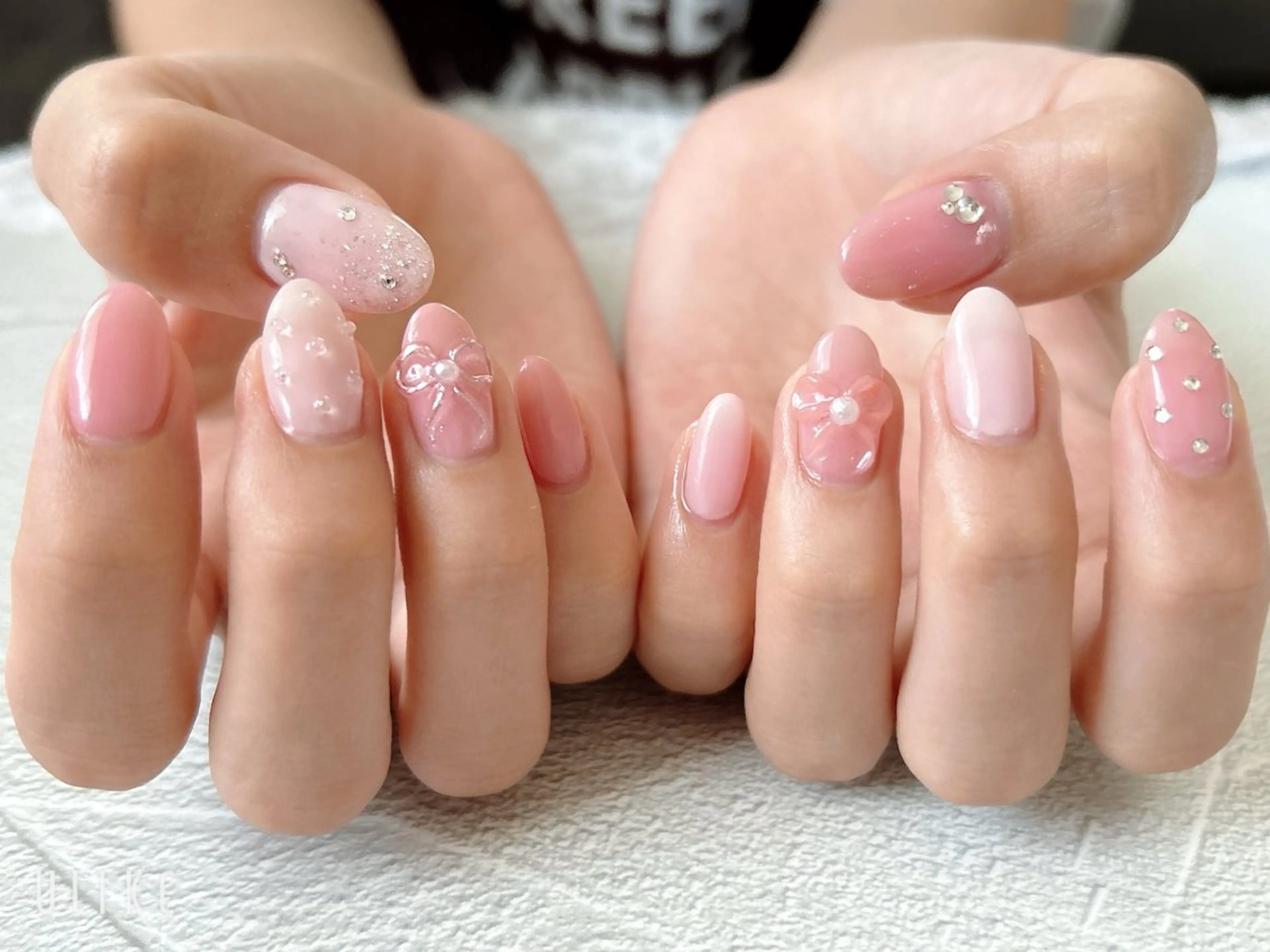 ネイル ピンク リボン ワンホンネイル takamin._.nail所属・t. takamiのネイルデザイン