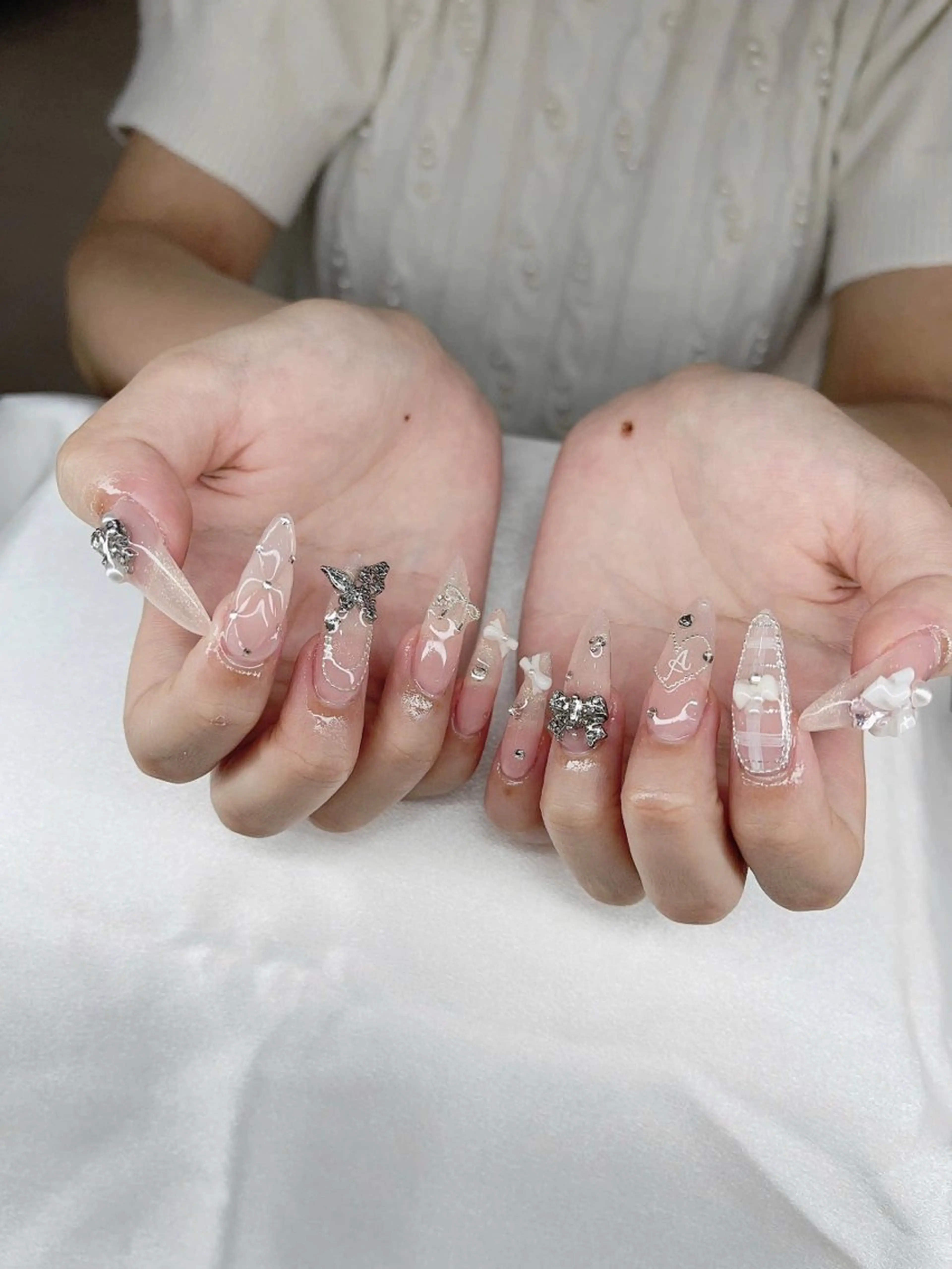 ネイル アニマル柄 オーロラネイル チークネイル フラッシュネイル ジェルネイル ハンドネイル T.A Nail Salon所属・Lyna Nail のネイルデザイン