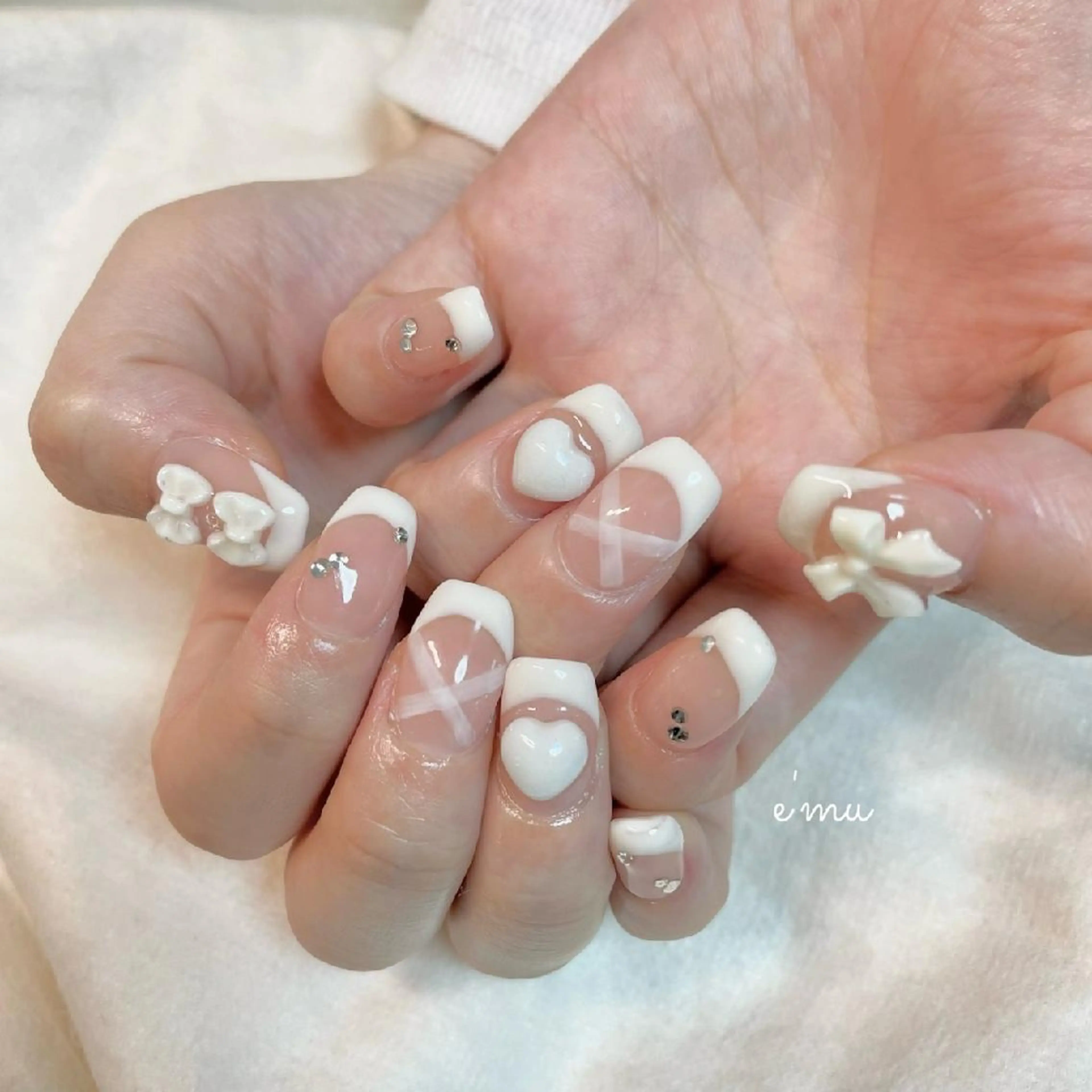 ネイル フレンチネイル ガーリー ハート リボン nail salon e'mu💐のネイルデザイン