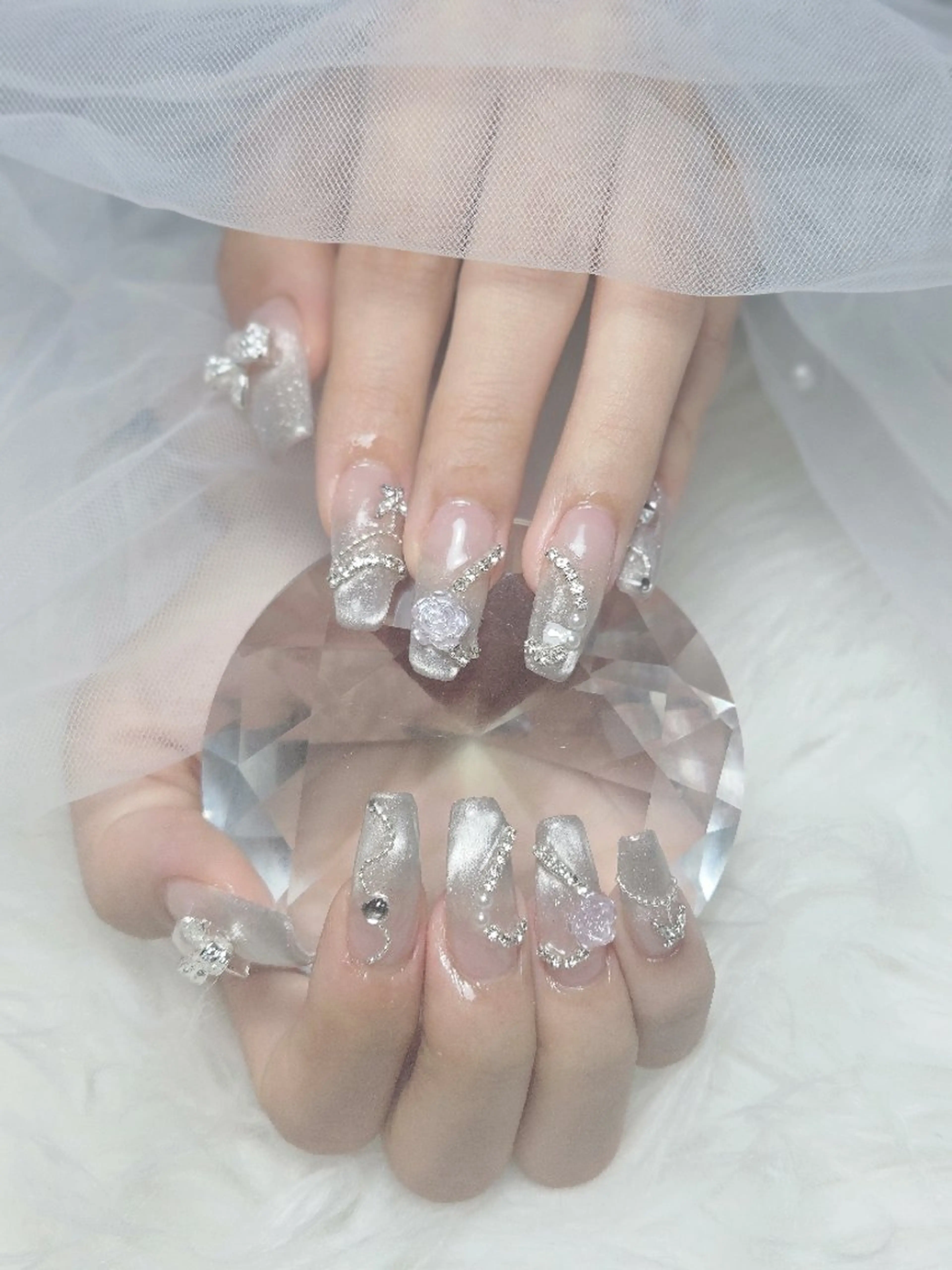 ハンドネイル 長さ出し(チップ) パーツ付け放題 (オフあり)の写真