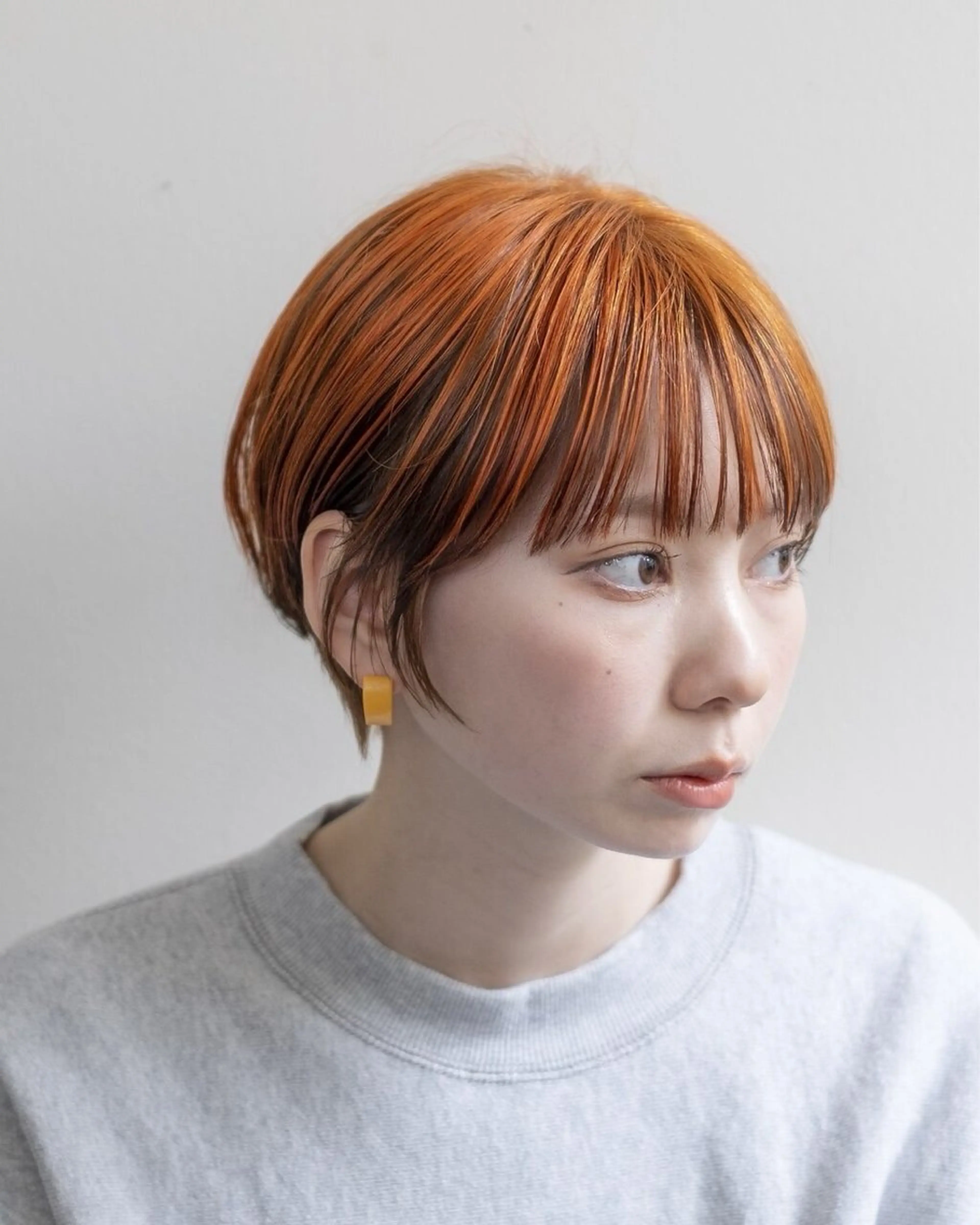 ショート カラー オレンジ ショートヘア 間瀬 玲央のヘアスタイル