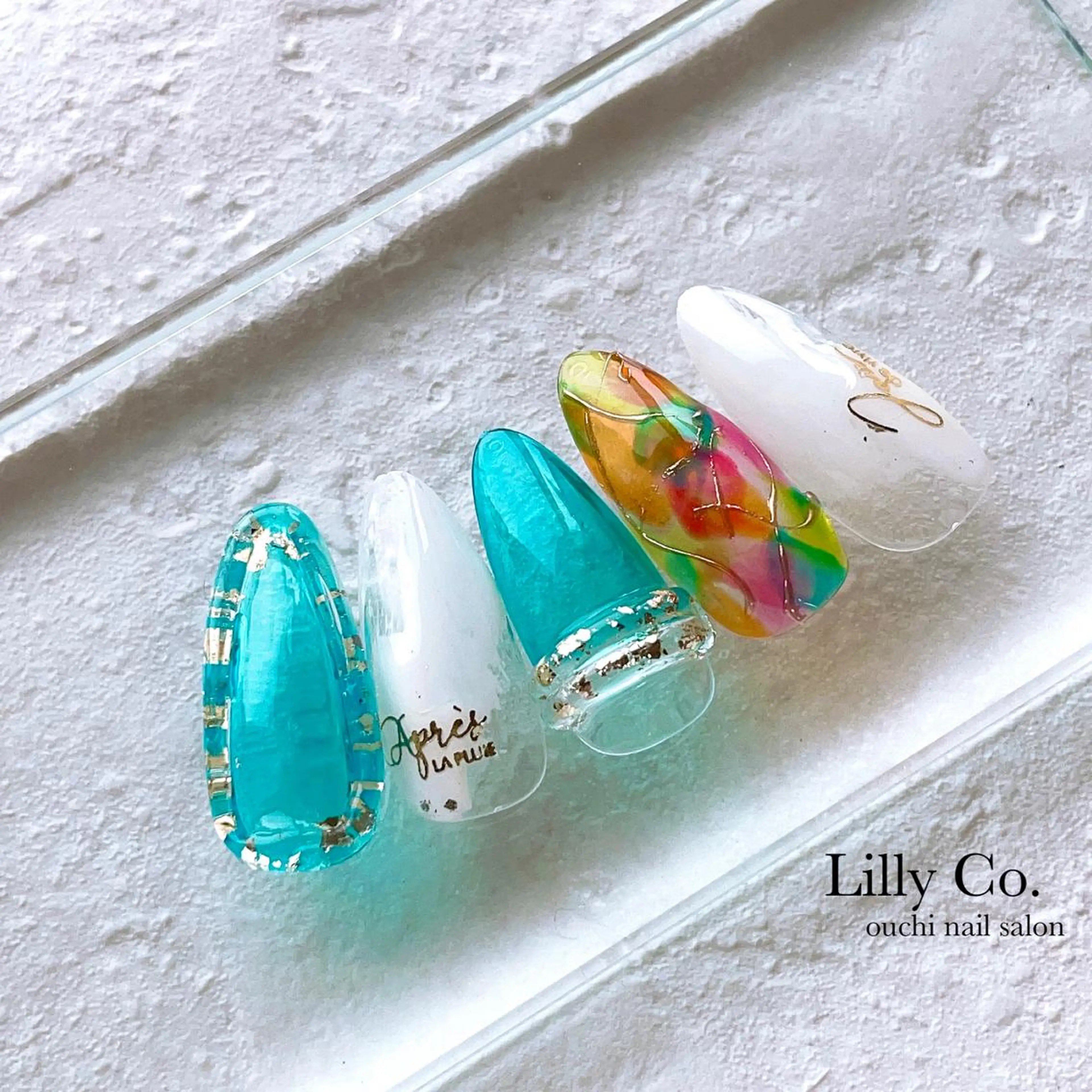 ネイル アートネイル ブルー クリアネイル キラキラネイル ハンドネイル ハンドケア Lilly Co.のネイルデザイン