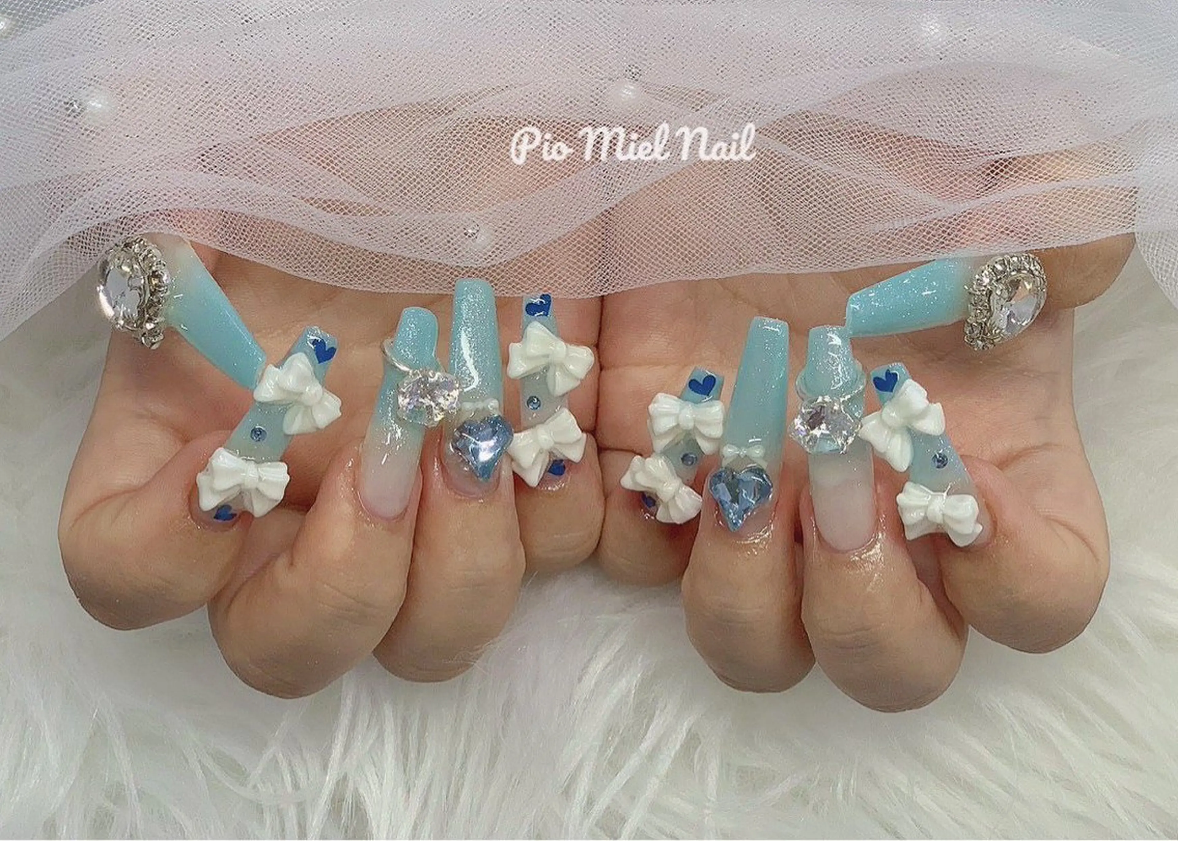 ネイル ブルー グラデーション ハート ラメ(グリッター) リボン ハンドネイル momo 長さだしのネイルデザイン
