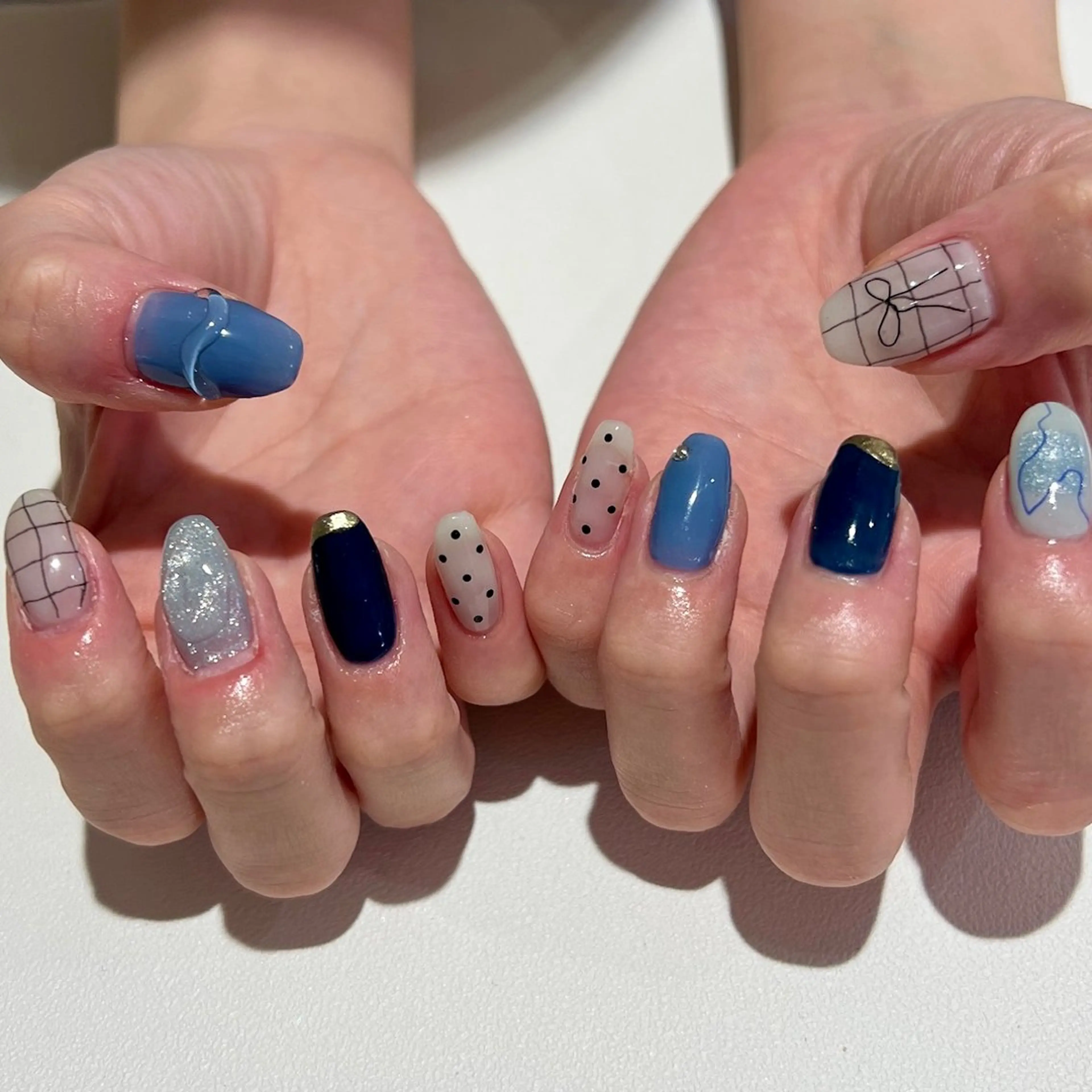ネイル ブルー ジェルネイル 韓国ネイル マグネットネイル ミラーネイル ハンドネイル 個性派ニュアンス nuts nail所属・【池袋】nuts nail　なつみのネイルデザイン