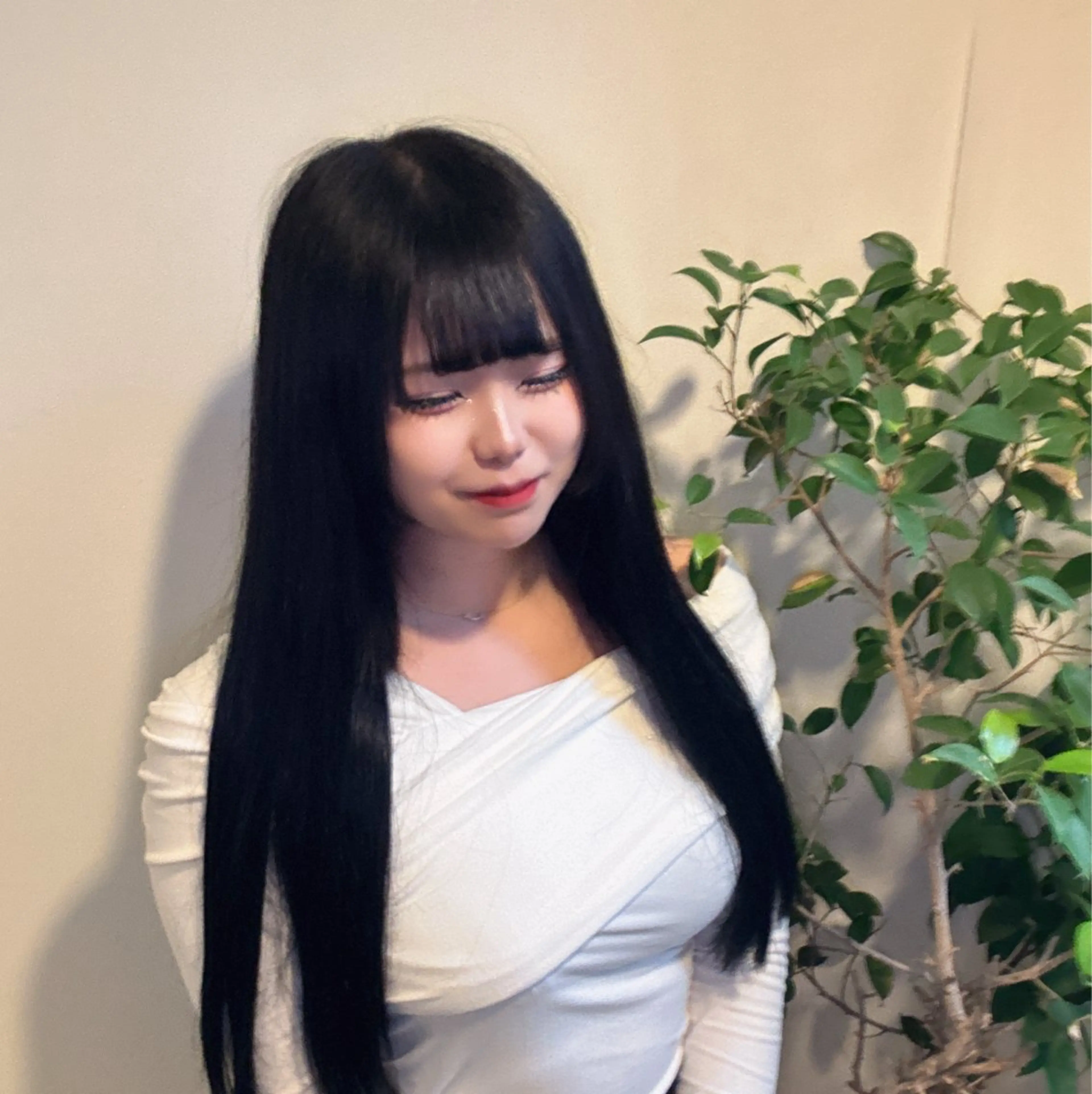ラウンドマッシュシャ ドウニュアンスパーマのヘアスタイル