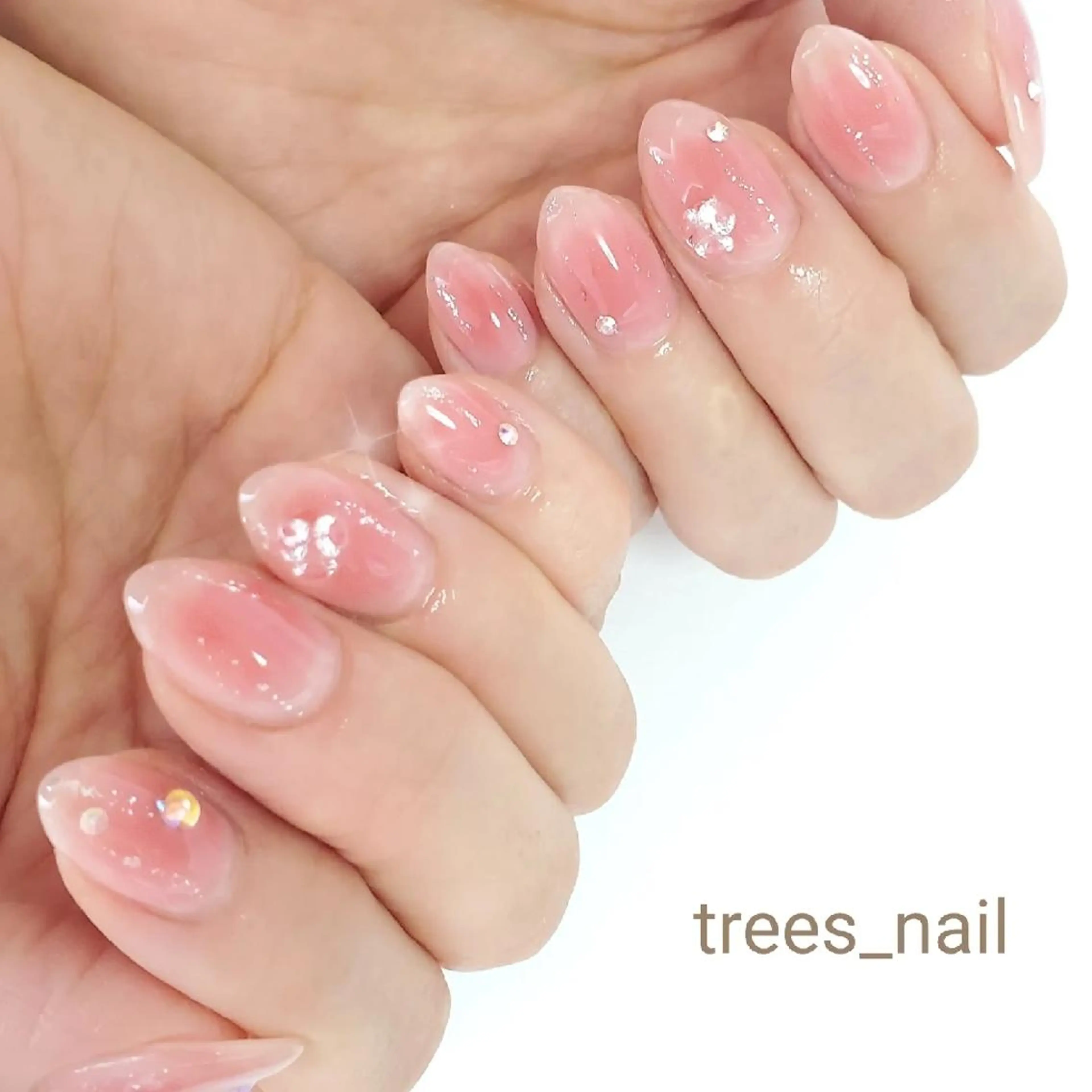 ネイル チークネイル ガーリー キラキラネイル ピンク ストーンネイル ハンドネイル フットネイル trees_ nailのネイルデザイン