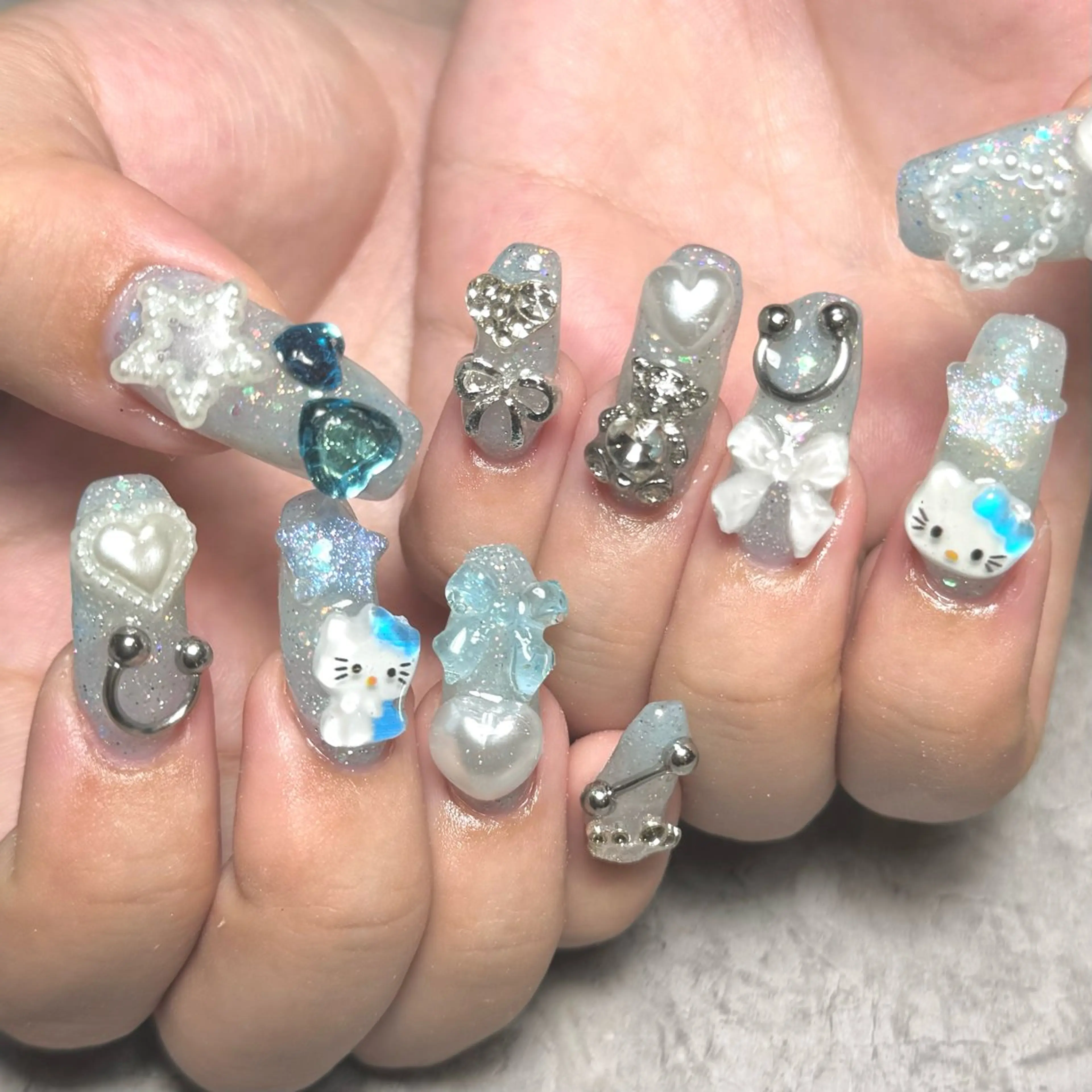 ネイル キラキラネイル リボン 夏ネイル ハンドネイル Nail Salon Lillion【リリオン】所属・lillion karenのネイルデザイン