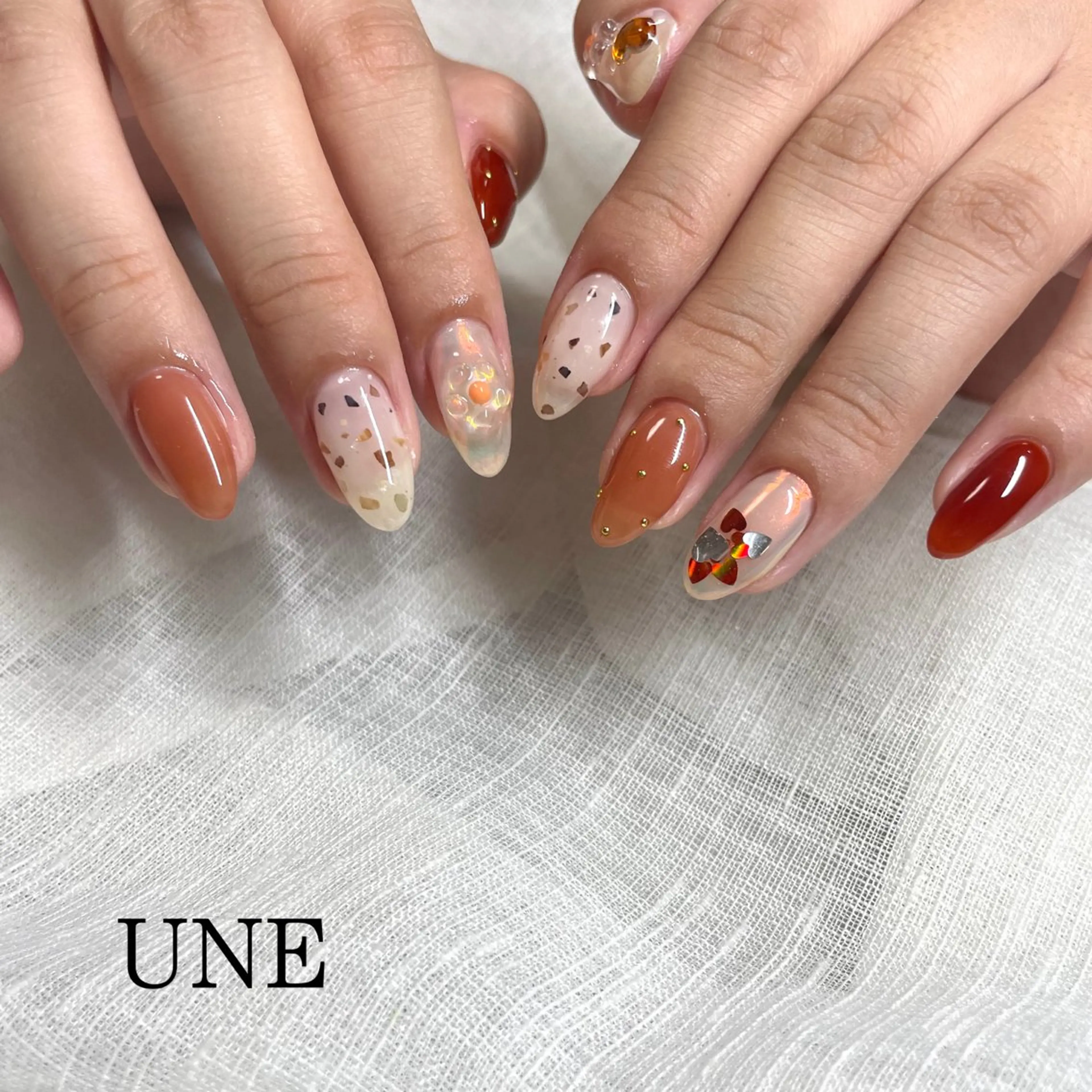 ネイル ブラウン UNE.【ユヌ】 Jr.NANAのネイルデザイン