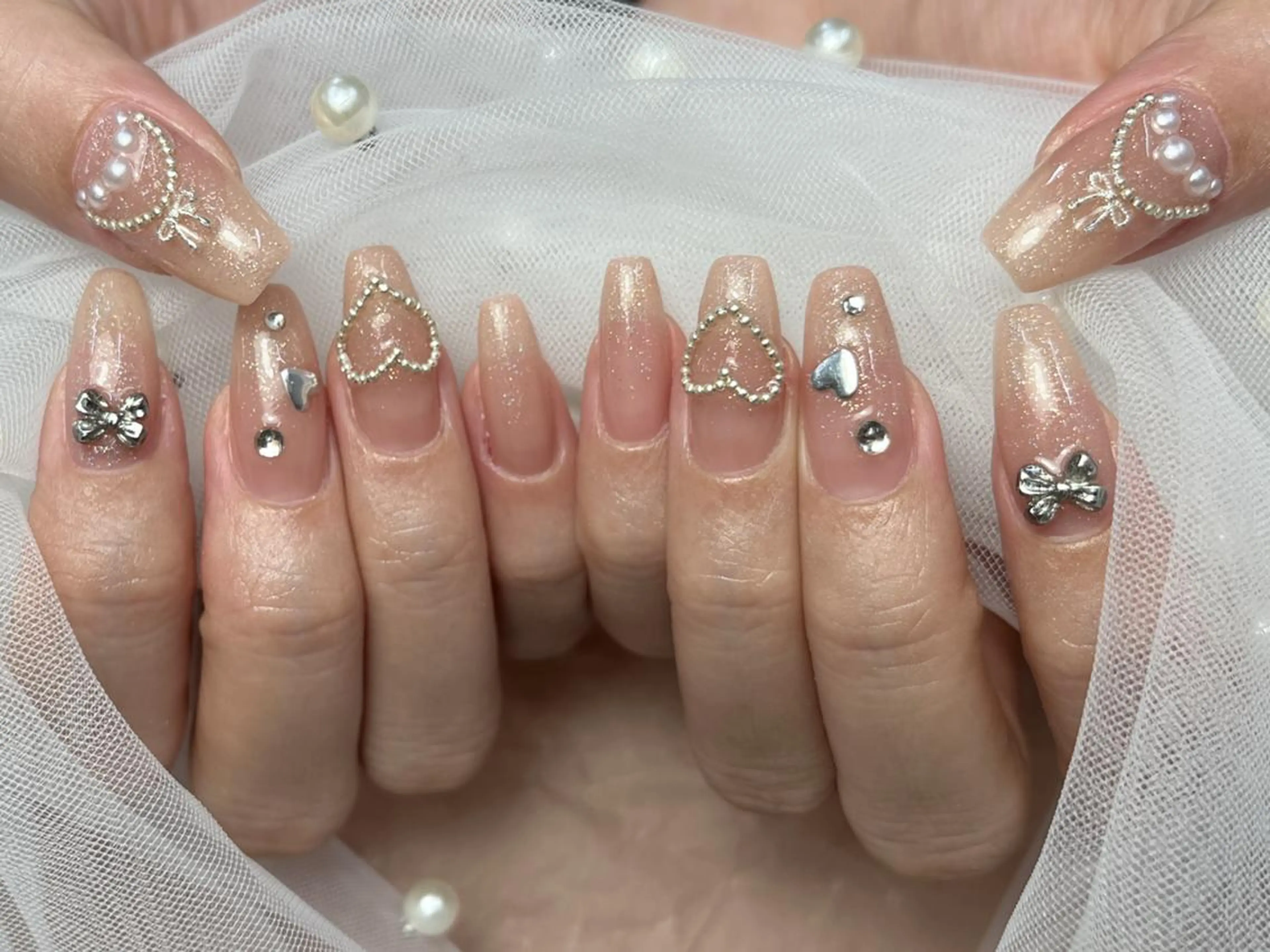ネイル ハート ピンク リボン ストーンネイル ハンドネイル ToliyDeliy Nail Salonのネイルデザイン