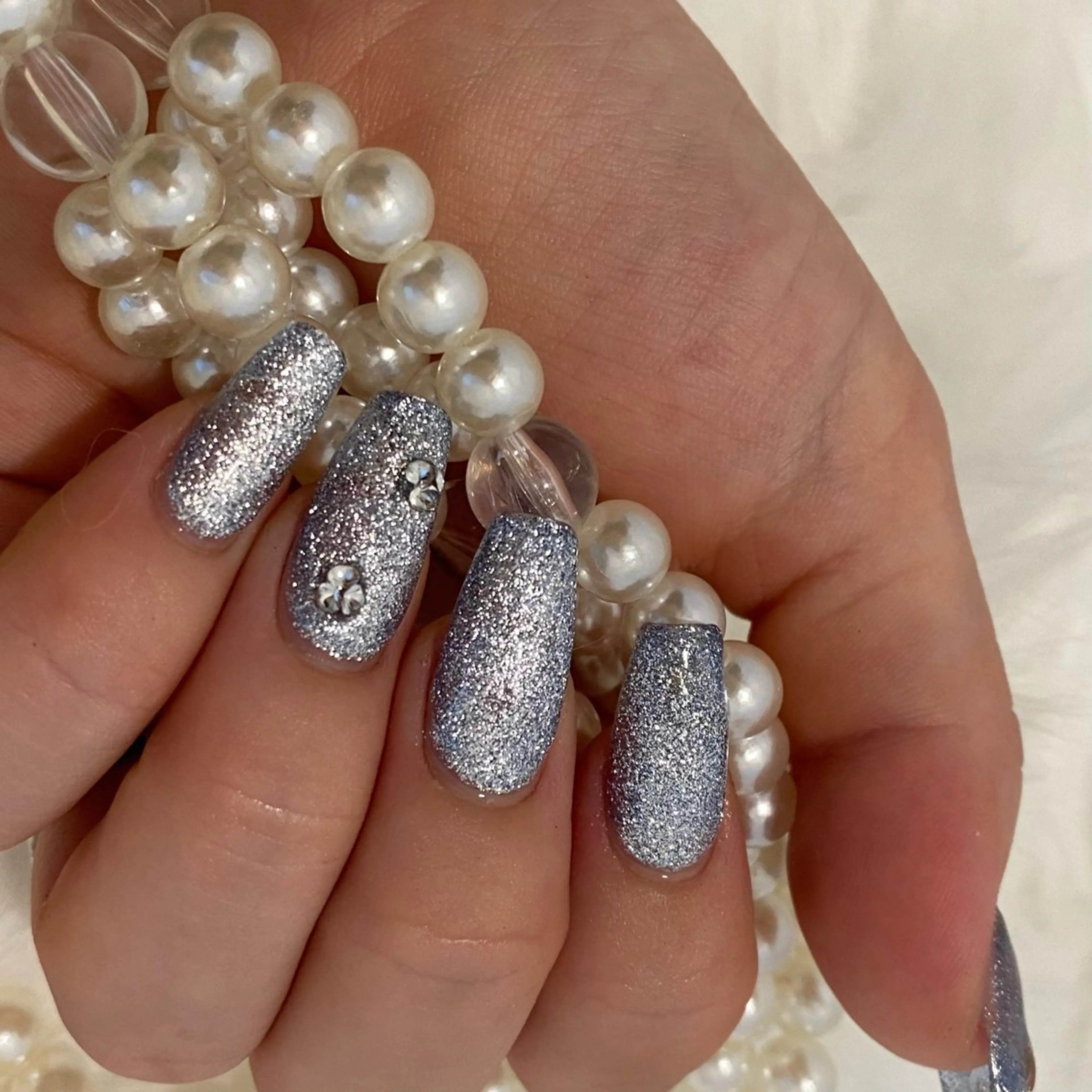 ネイル ラメ(グリッター) 水色 ストーンネイル PON nailのネイルデザイン