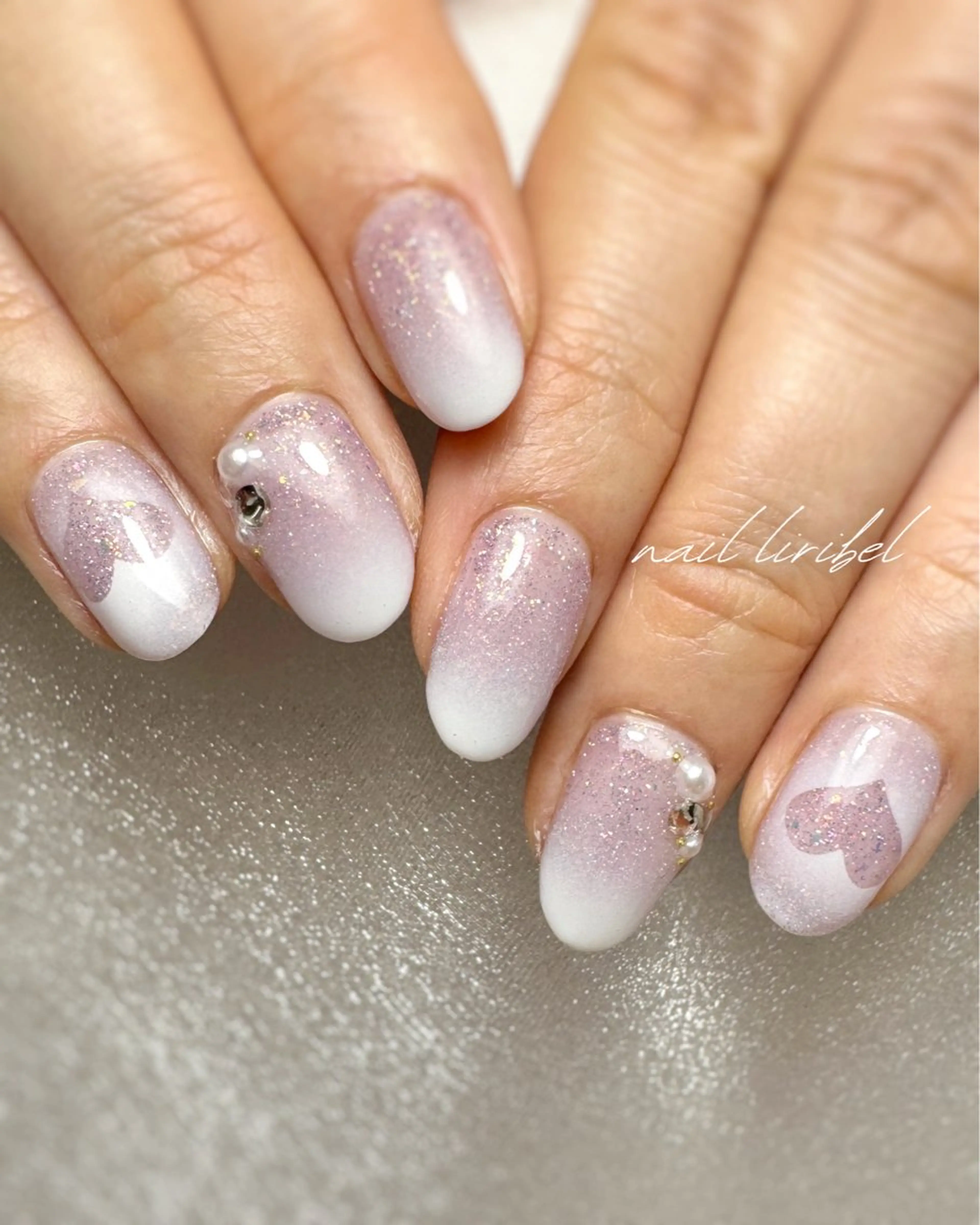 ネイル フラッシュネイル グラデーション ハート キラキラネイル ハンドネイル Nail Liribelのネイルデザイン