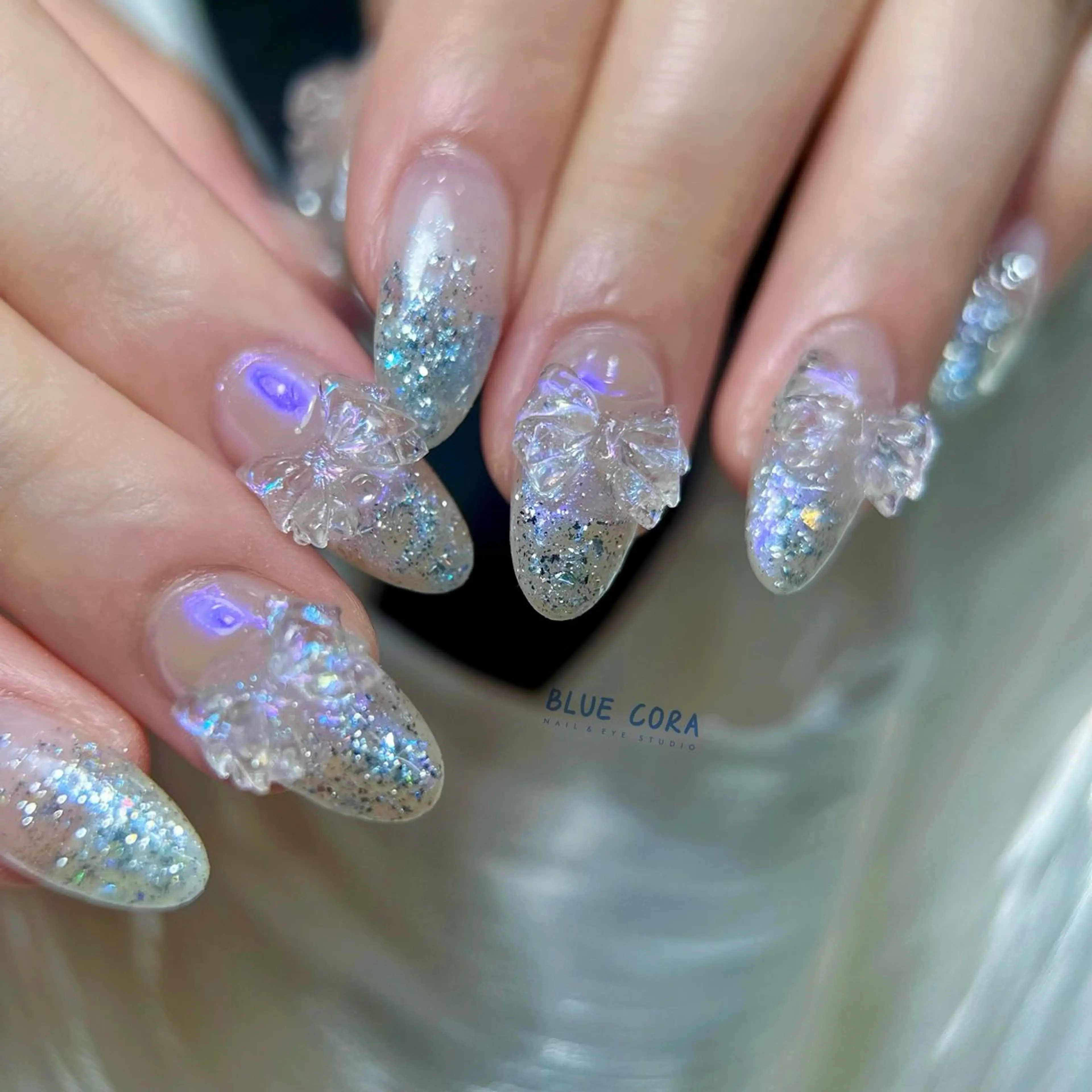 ネイル オーロラネイル クリアネイル ラメ(グリッター) ハンドネイル ハンドケア BLUE CORA所属・BLUE CORAのネイルデザイン