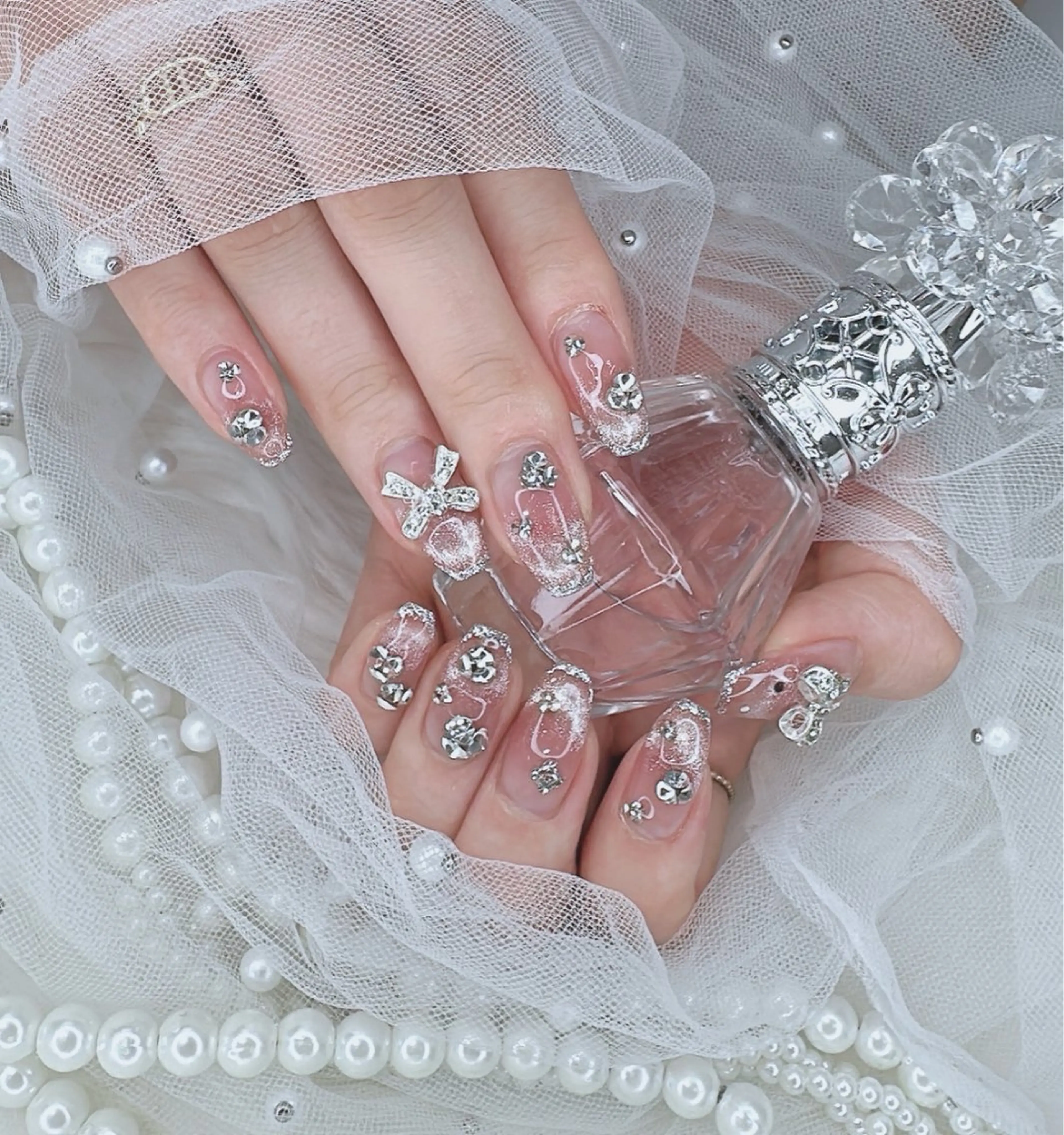 ネイル リボン ハンドネイル R nailsalon所属・R salonのネイルデザイン