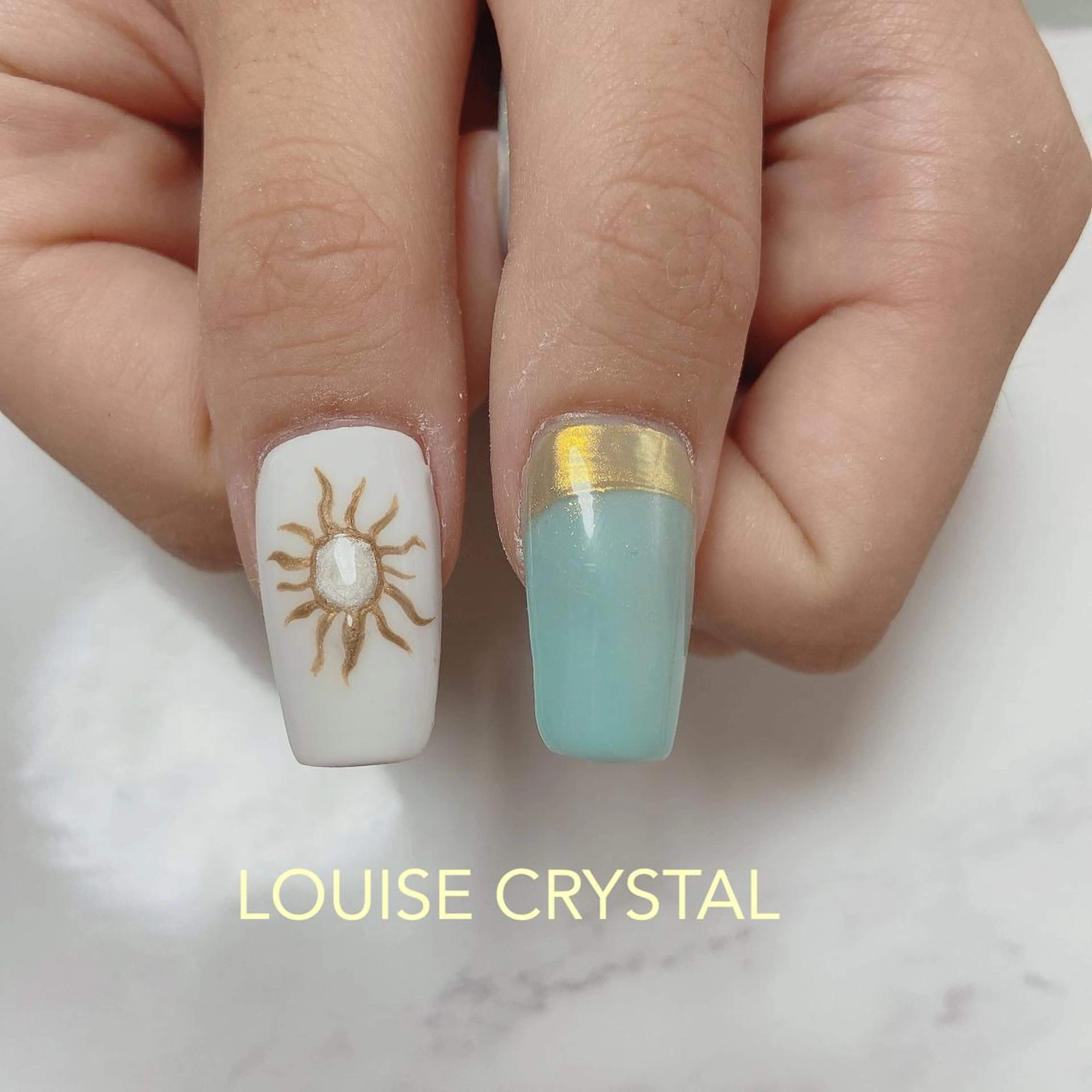 ネイル ハンドネイル LOUISE CRYSTALのネイルデザイン