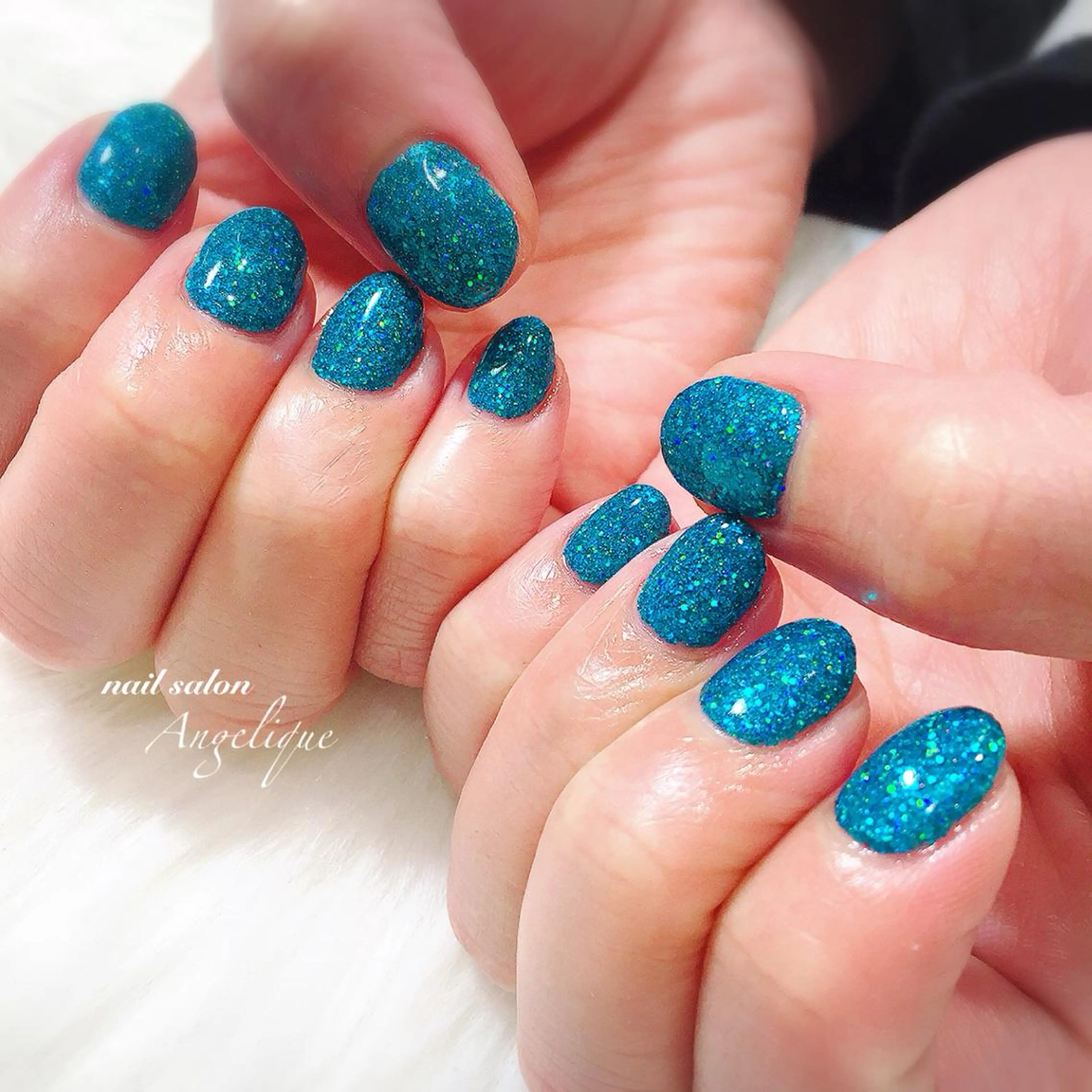 ネイル オーロラネイル ブルー グリーン キラキラネイル ラメ(グリッター) Angelique所属・Nail salon Angeliqueのネイルデザイン