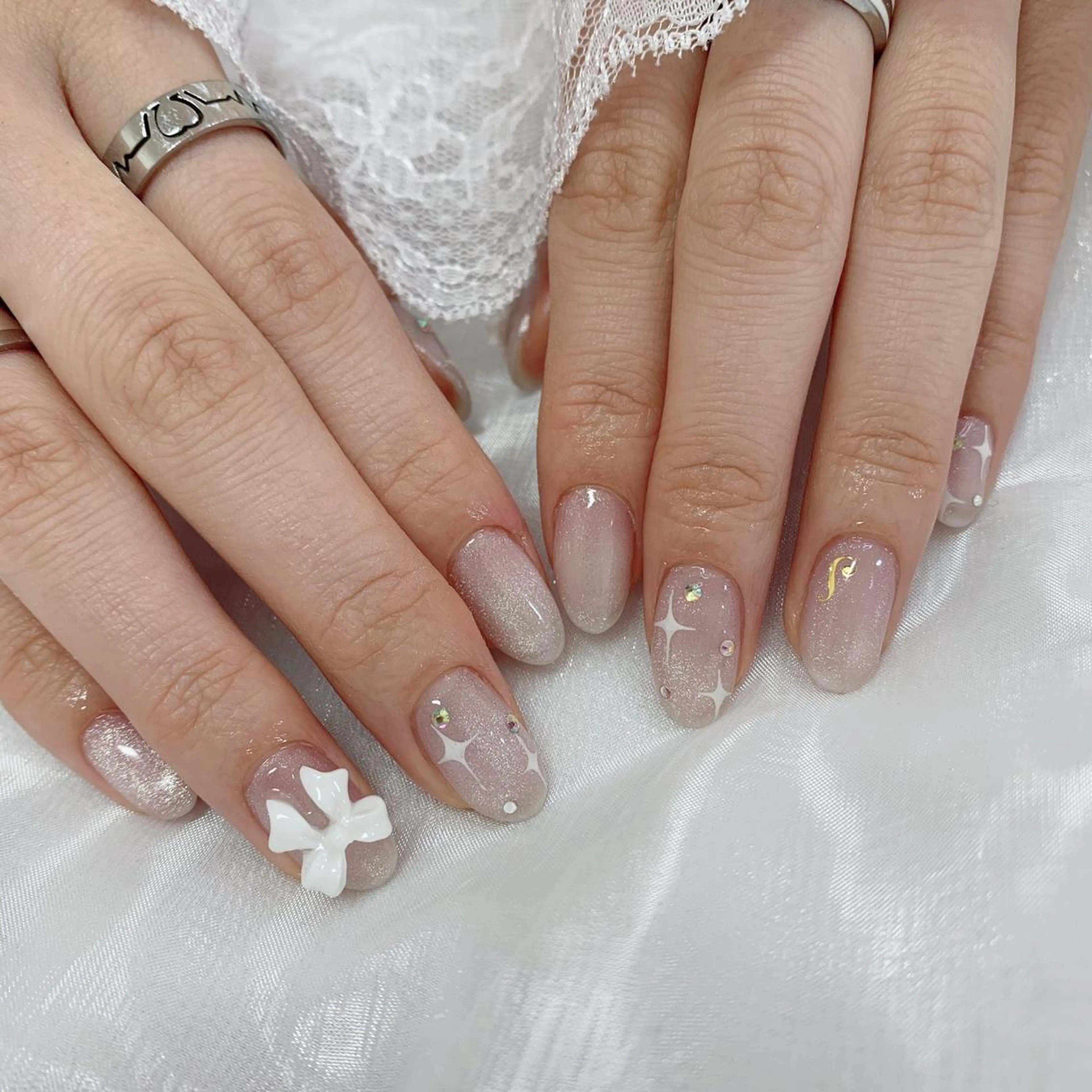 ネイル リボン ハンドネイル La neige* yuki 🥯🍑のネイルデザイン