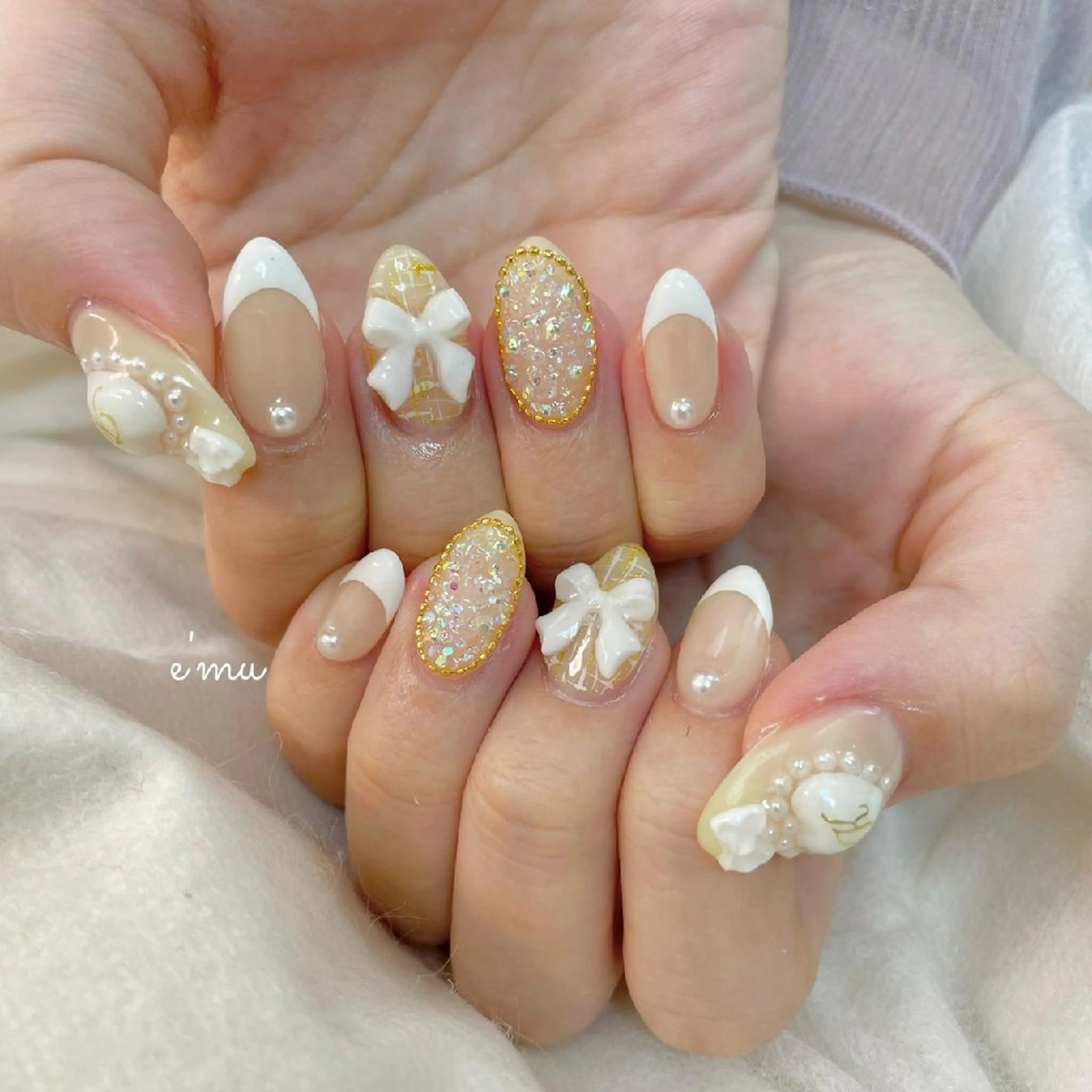 ネイル フレンチネイル ガーリー リボン 黄色 nail salon e'mu💐のネイルデザイン