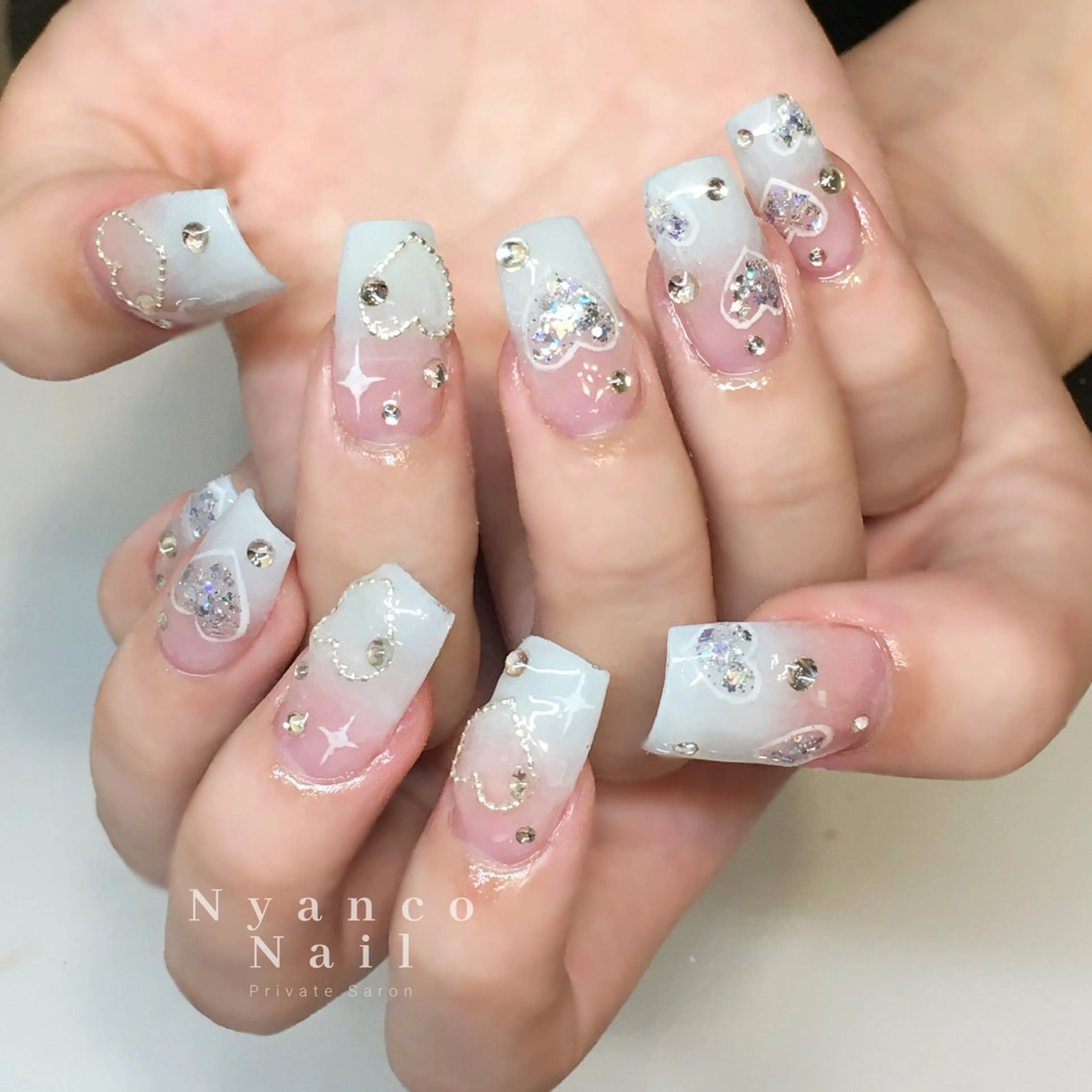 ネイル ジェルネイル グラデーション ハート キラキラネイル 水色 Nyanco Nailのネイルデザイン