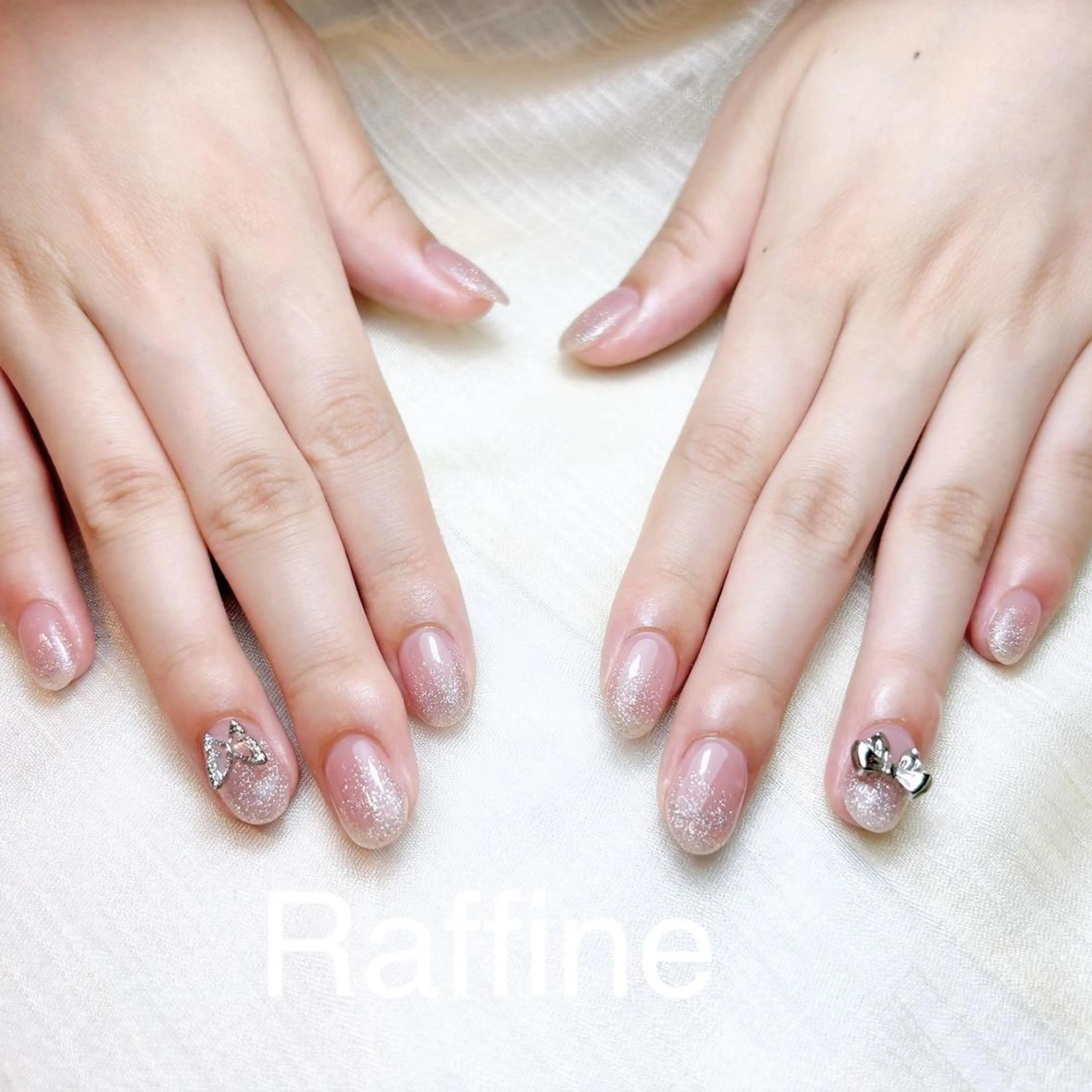 ネイル RAFFINE 月🦋🩵のネイルデザイン