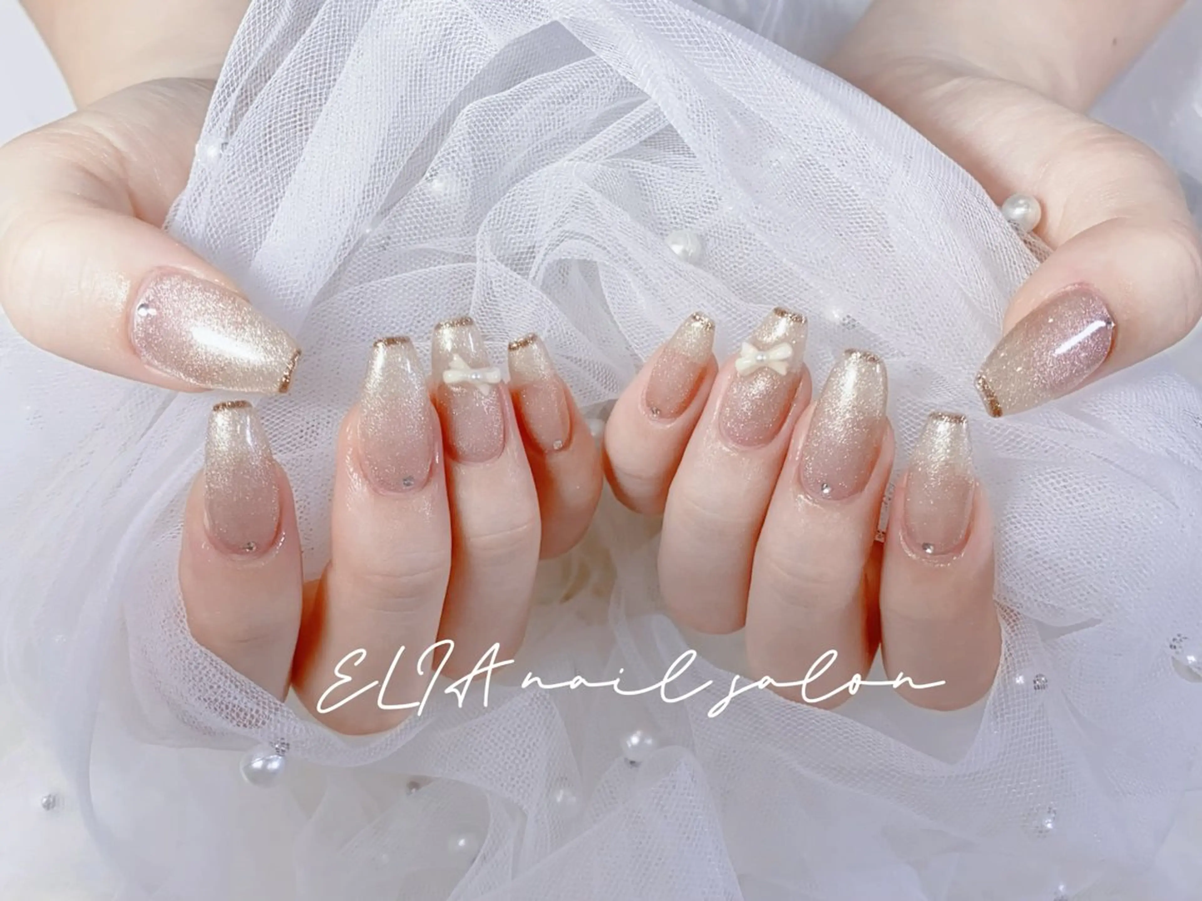 ネイル チークネイル 長さ出し グラデーション ラメ(グリッター) ラメグラデーション ハンドネイル ハンドケア ELIA【エリア】 nailsalonのネイルデザイン