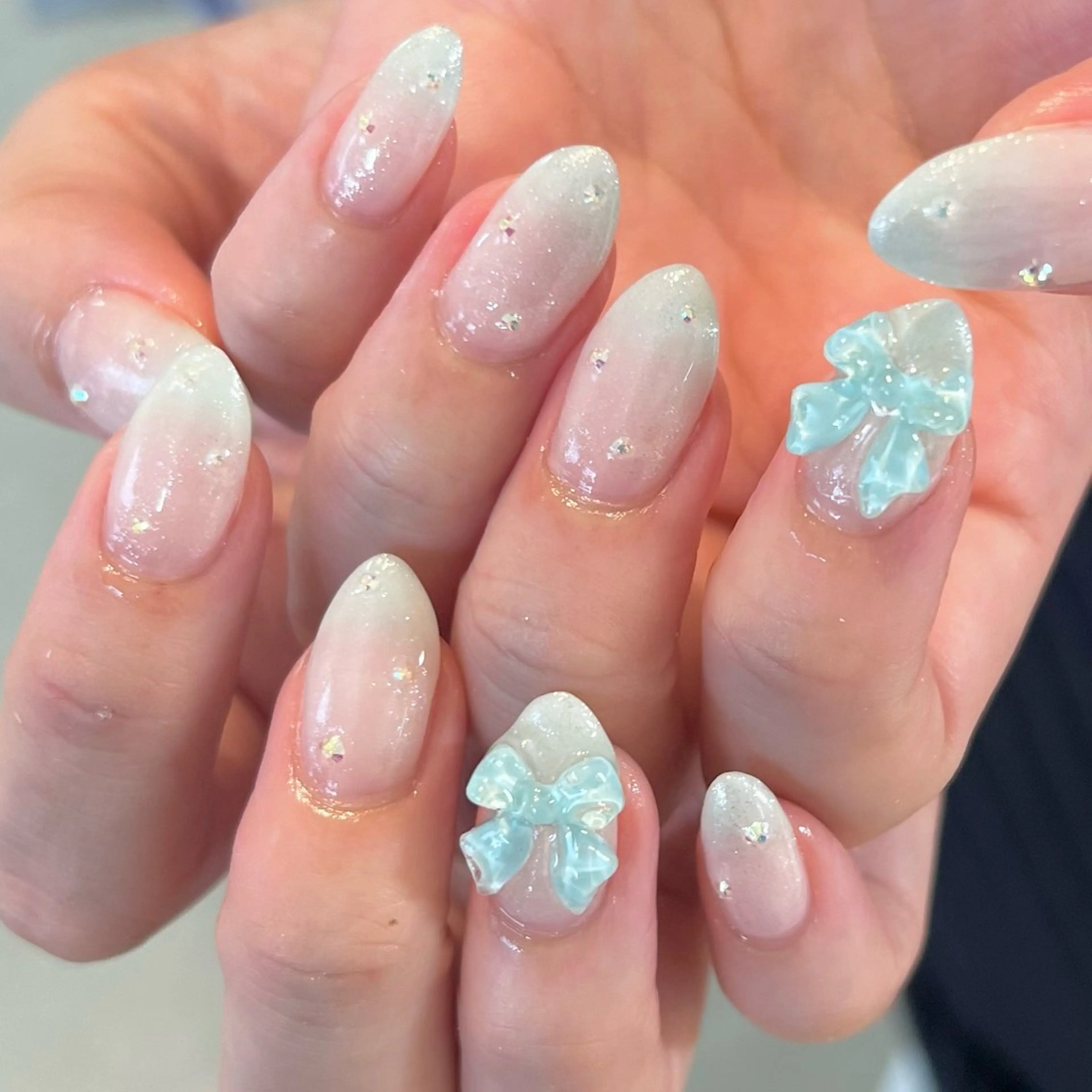 ネイル リボン ハンドネイル sio.nail&eyebrow salon shimokitazawa2号店所属・nailist mana𖤐´-のネイルデザイン