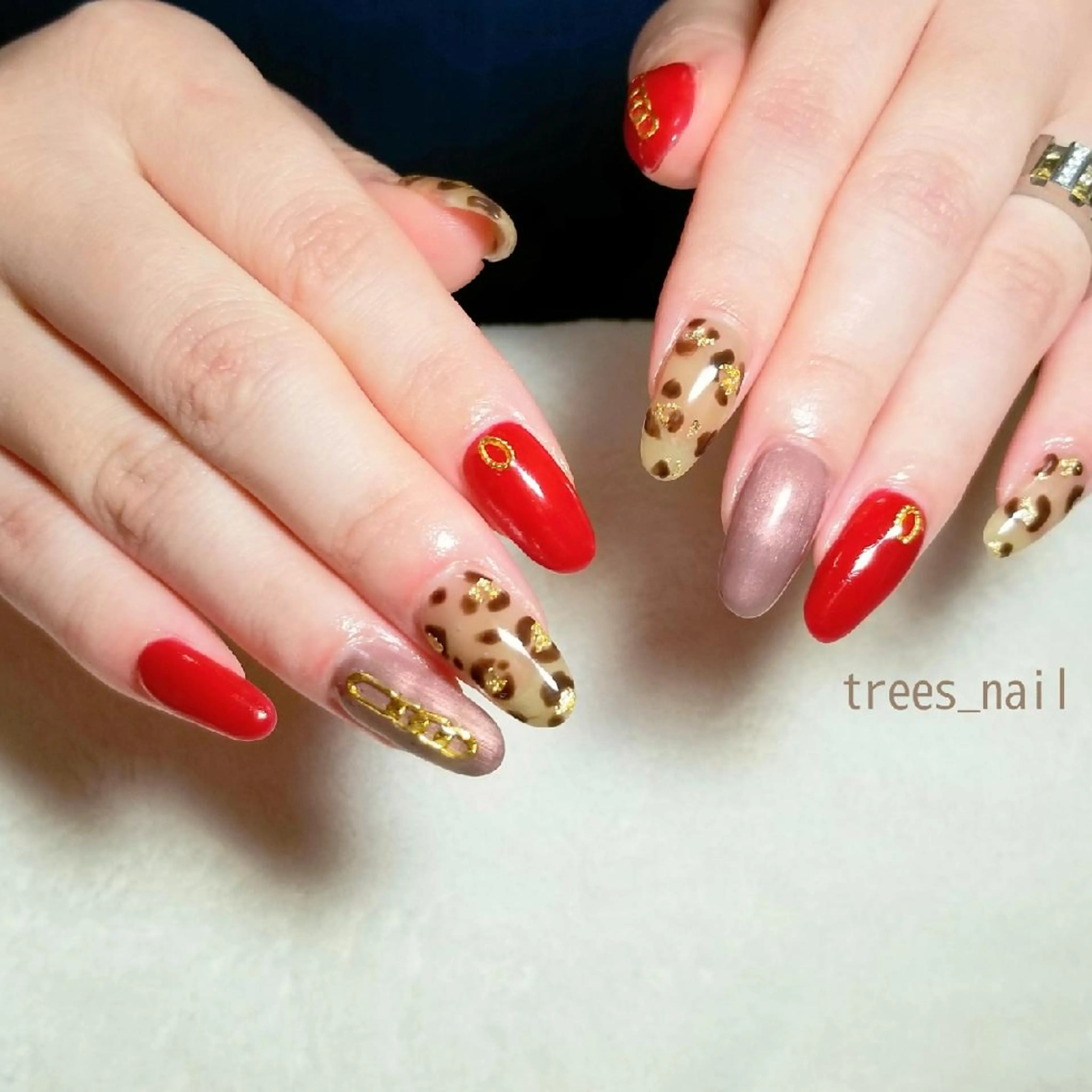 ネイル アニマル柄 赤色 ハンドネイル フットネイル trees_ nailのネイルデザイン