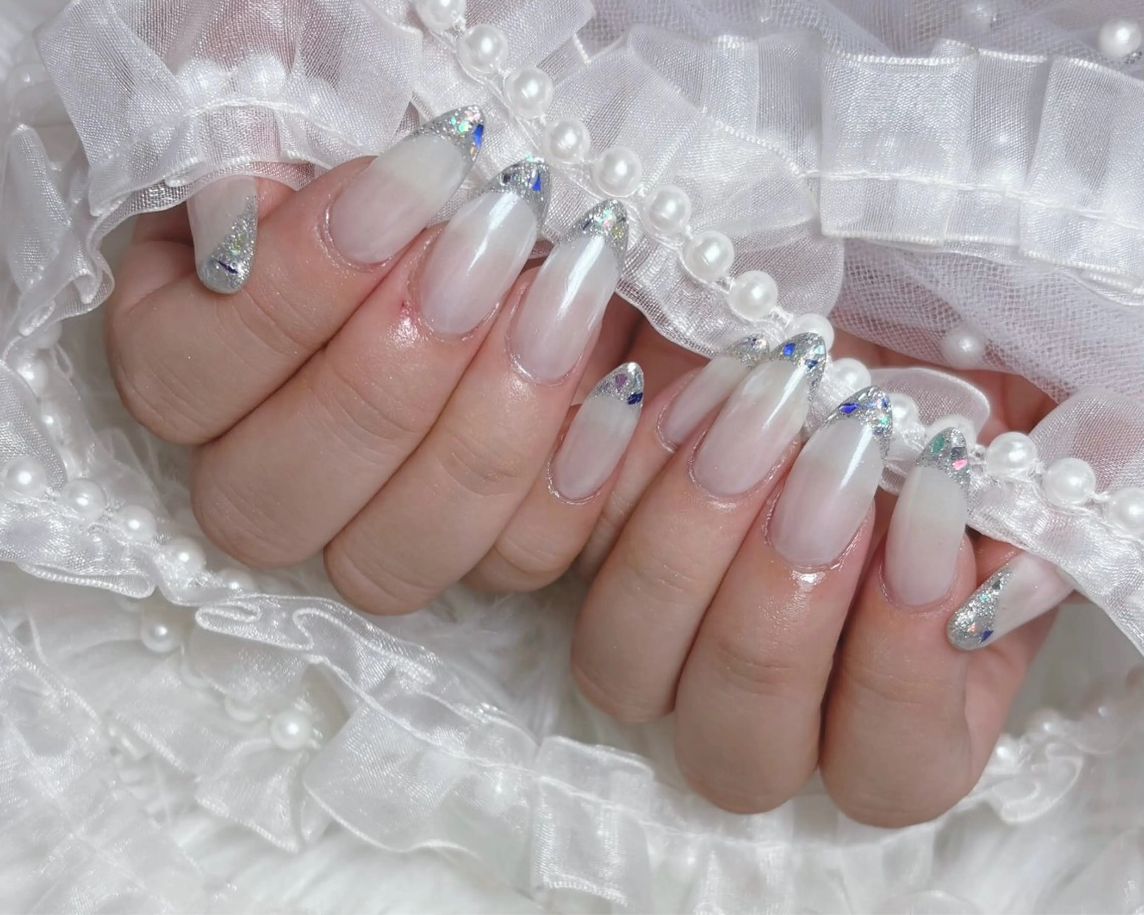 ガラスフレンチネイル💎️🫧の写真