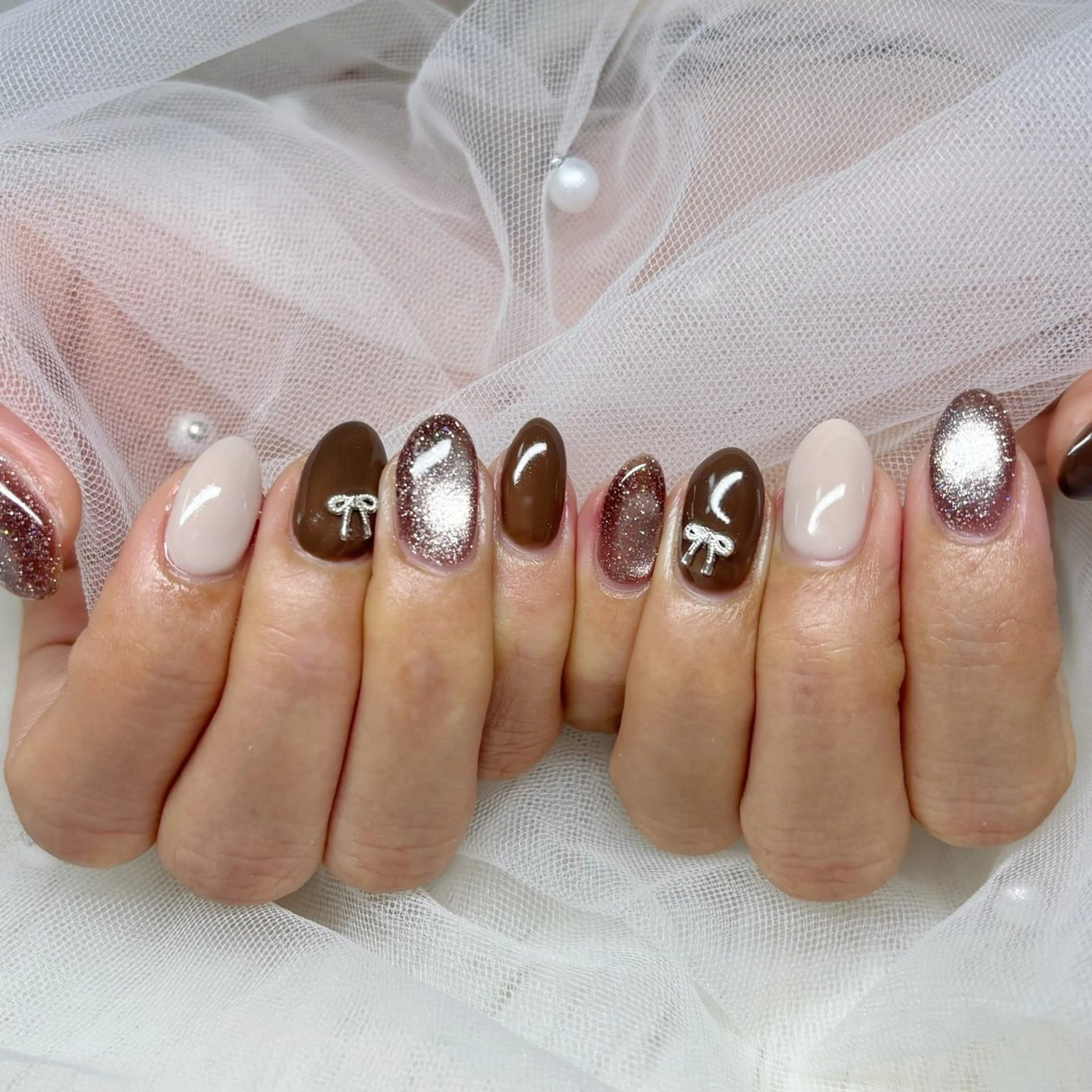 ネイル ブラウン ハンドネイル Yuna🩵 RE:N.Nailのネイルデザイン