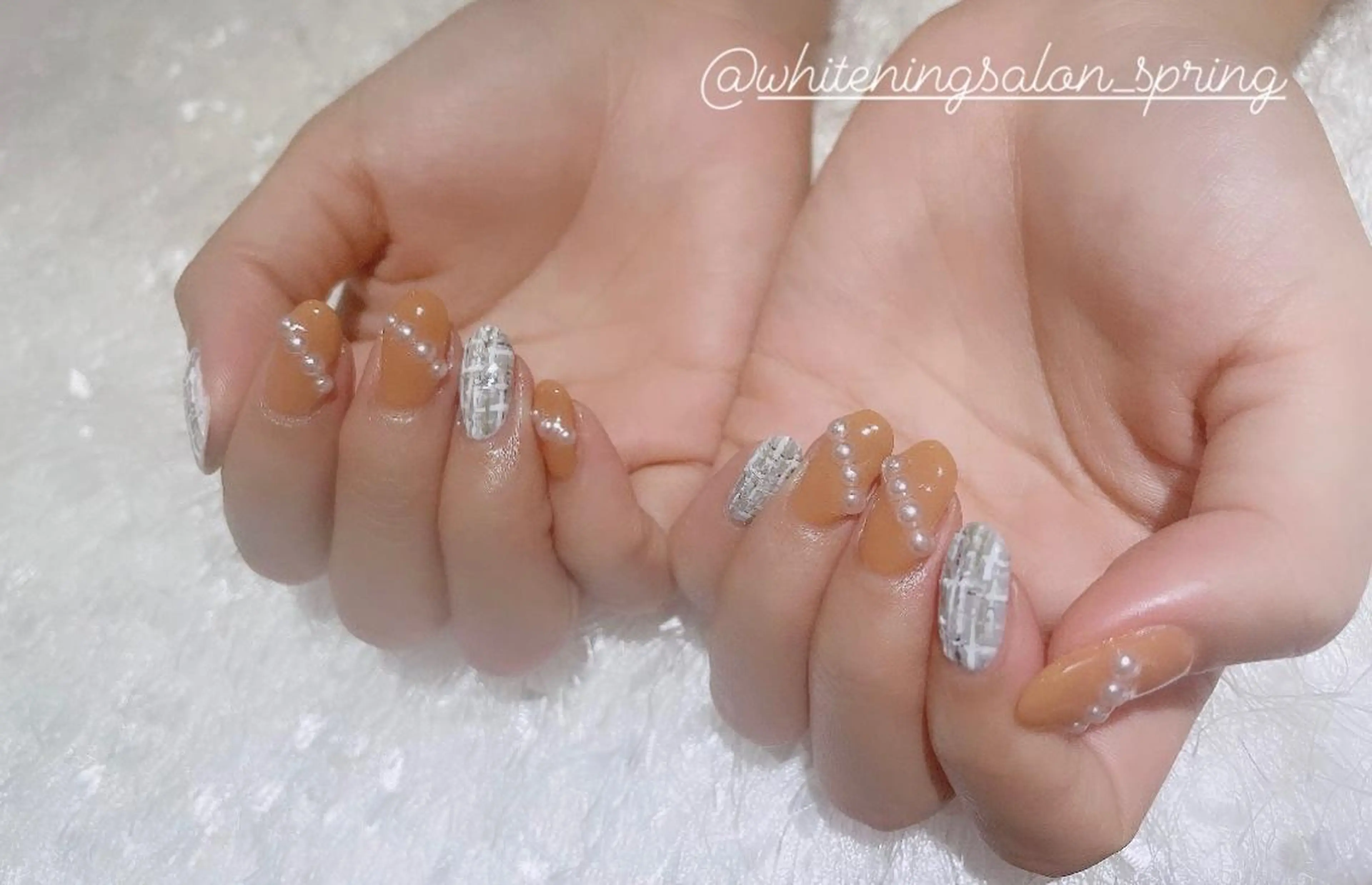 ネイル オレンジ ツイードネイル Nakao Hitomiのネイルデザイン